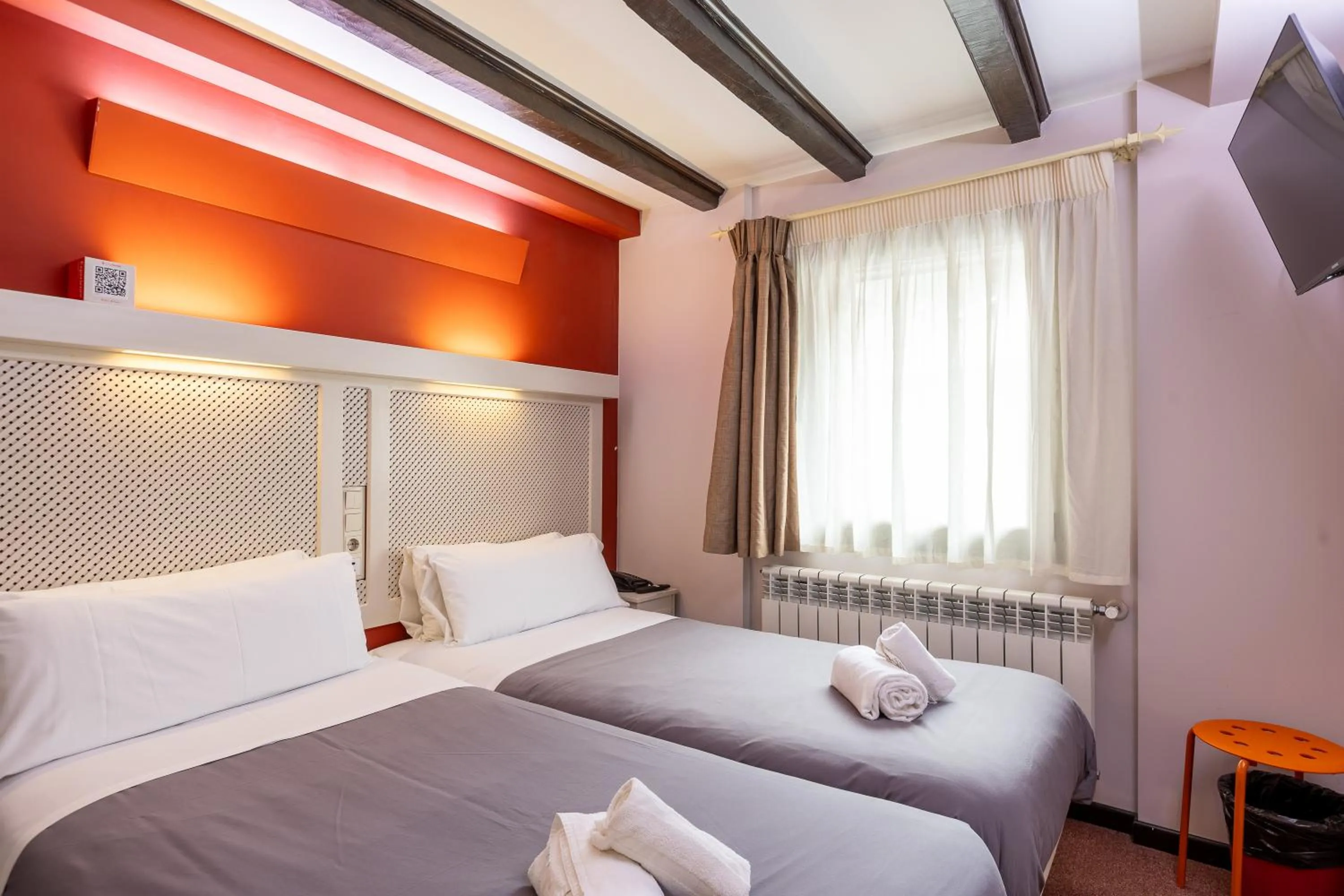 Bed in Hotel Micolau