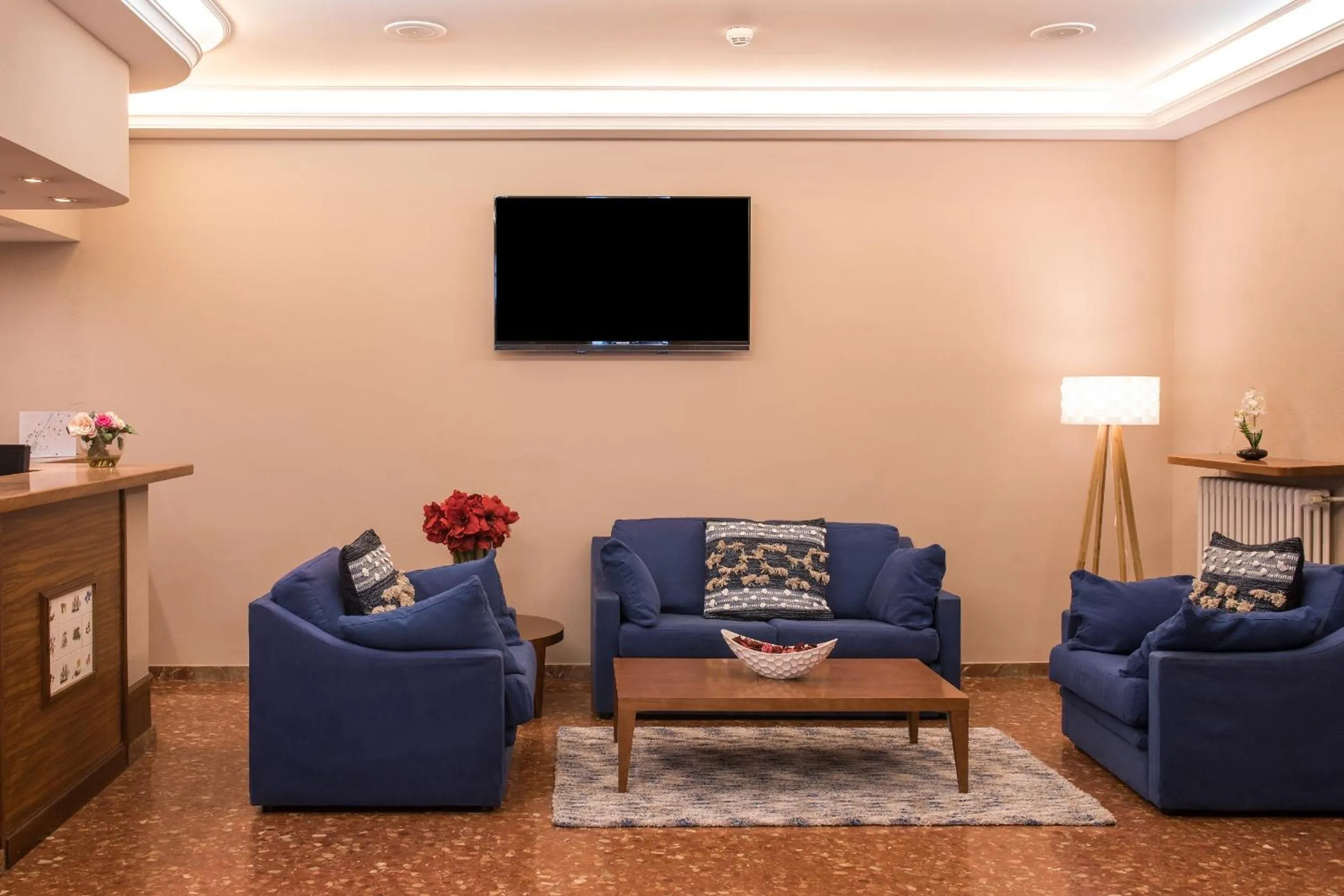 Communal lounge/ TV room in Evenia Oros