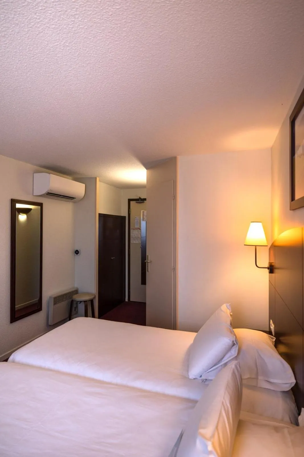 Photo of the whole room, Bed in Kyriad Chateauroux