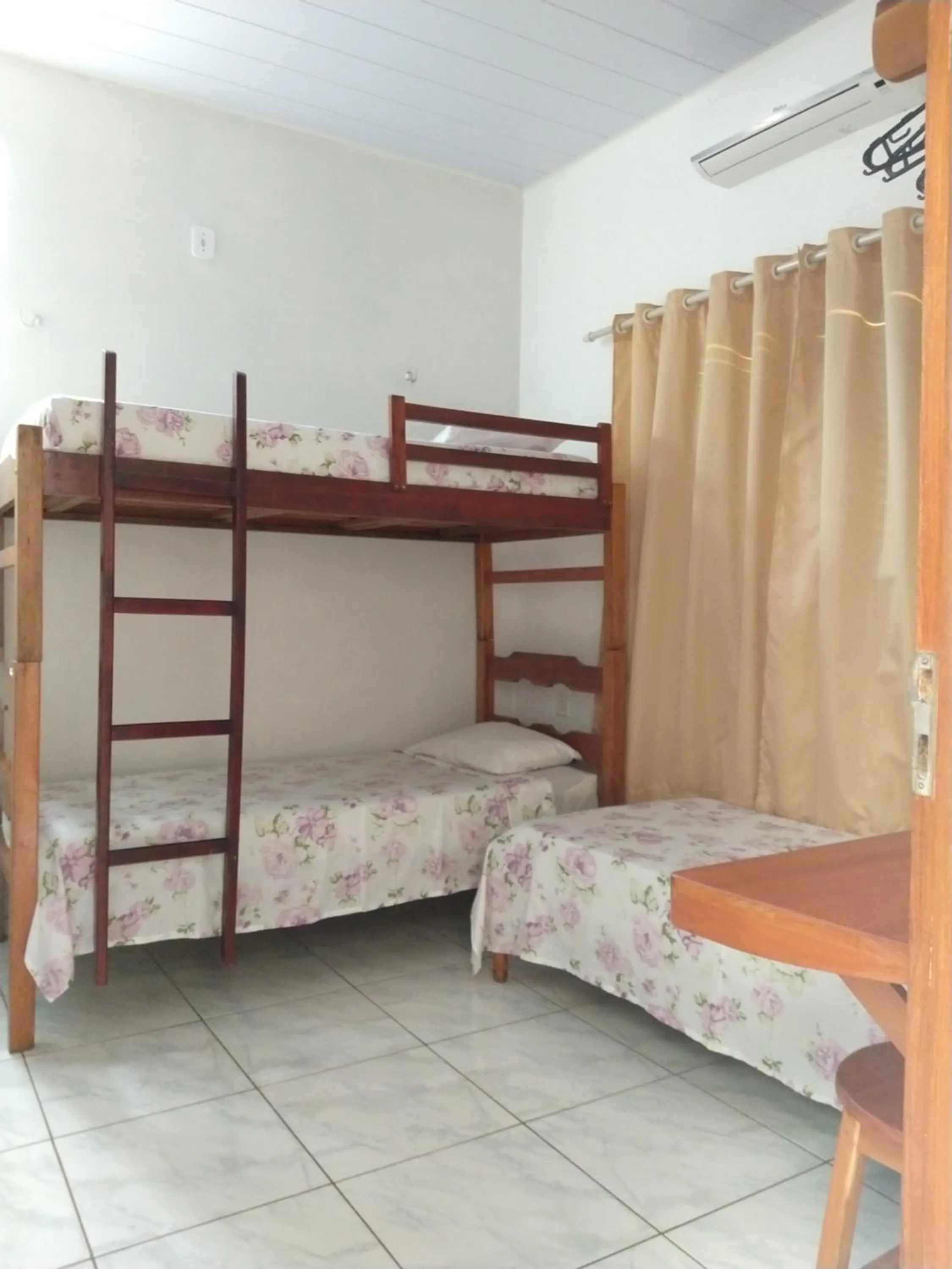 Bed in Pousada Jatobá