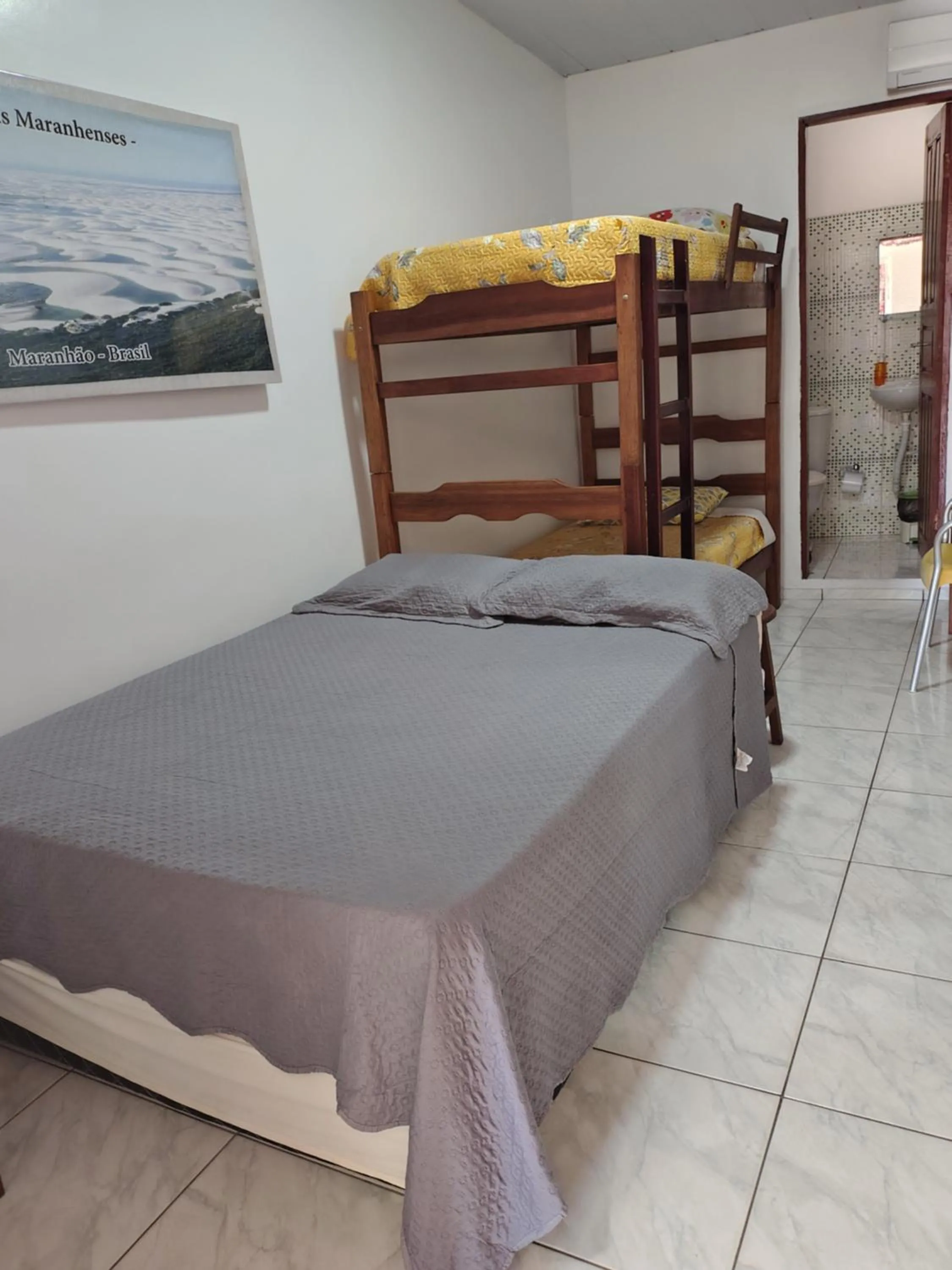 Photo of the whole room, Bed in Pousada Jatobá