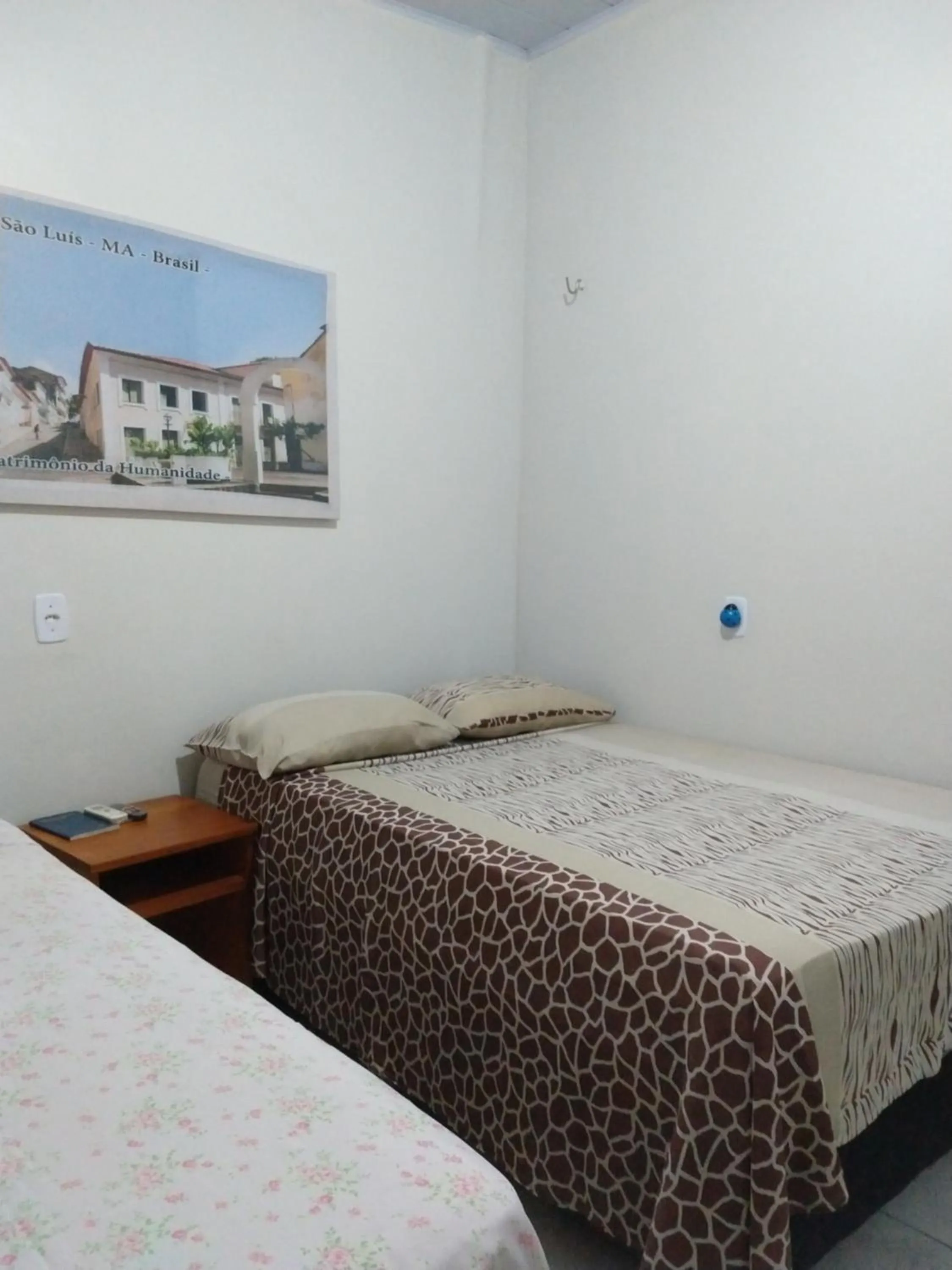 Bed in Pousada Jatobá
