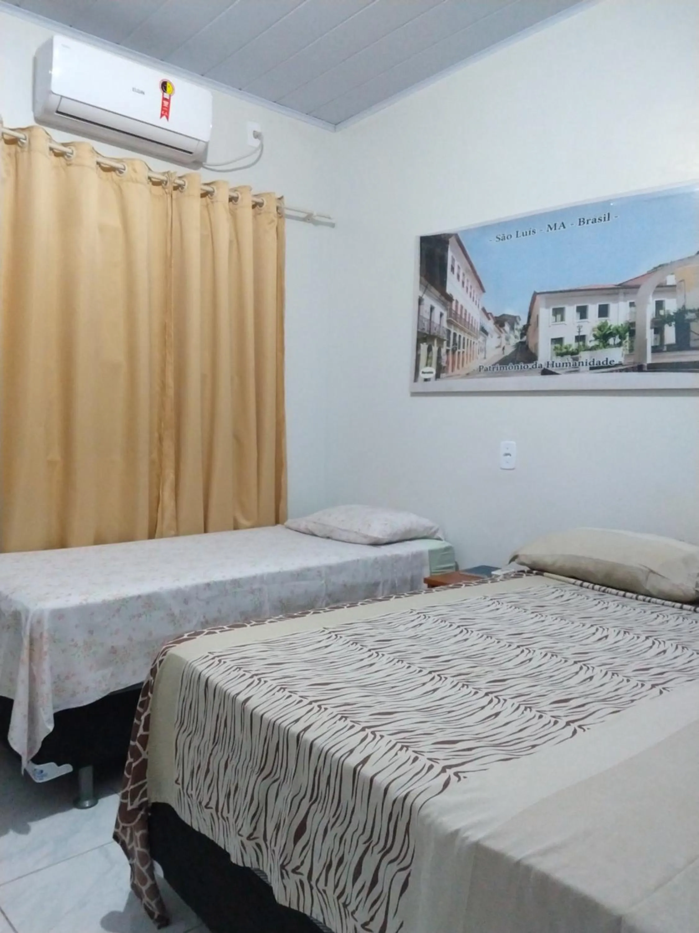 Bed in Pousada Jatobá