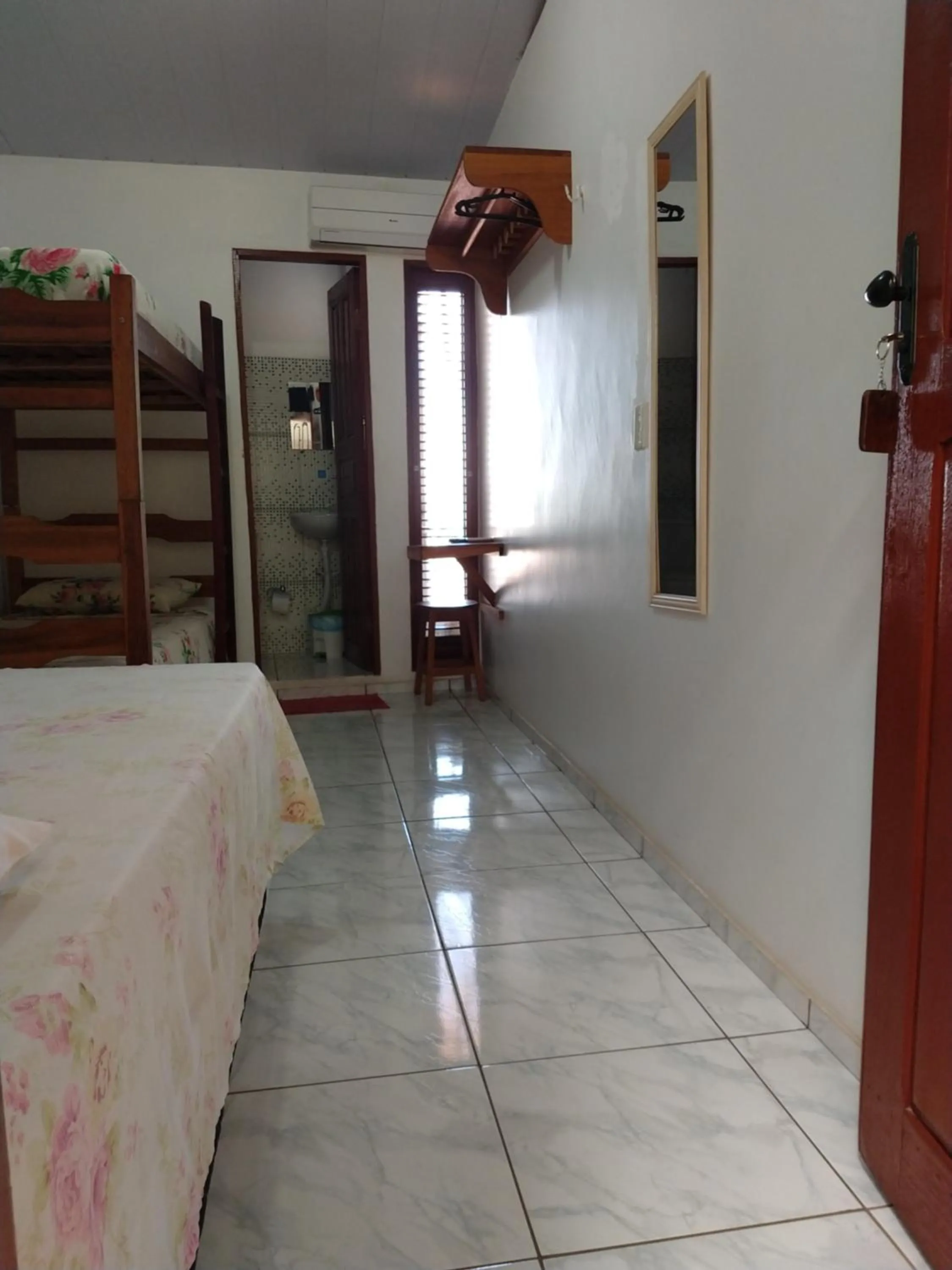 Photo of the whole room, Bed in Pousada Jatobá
