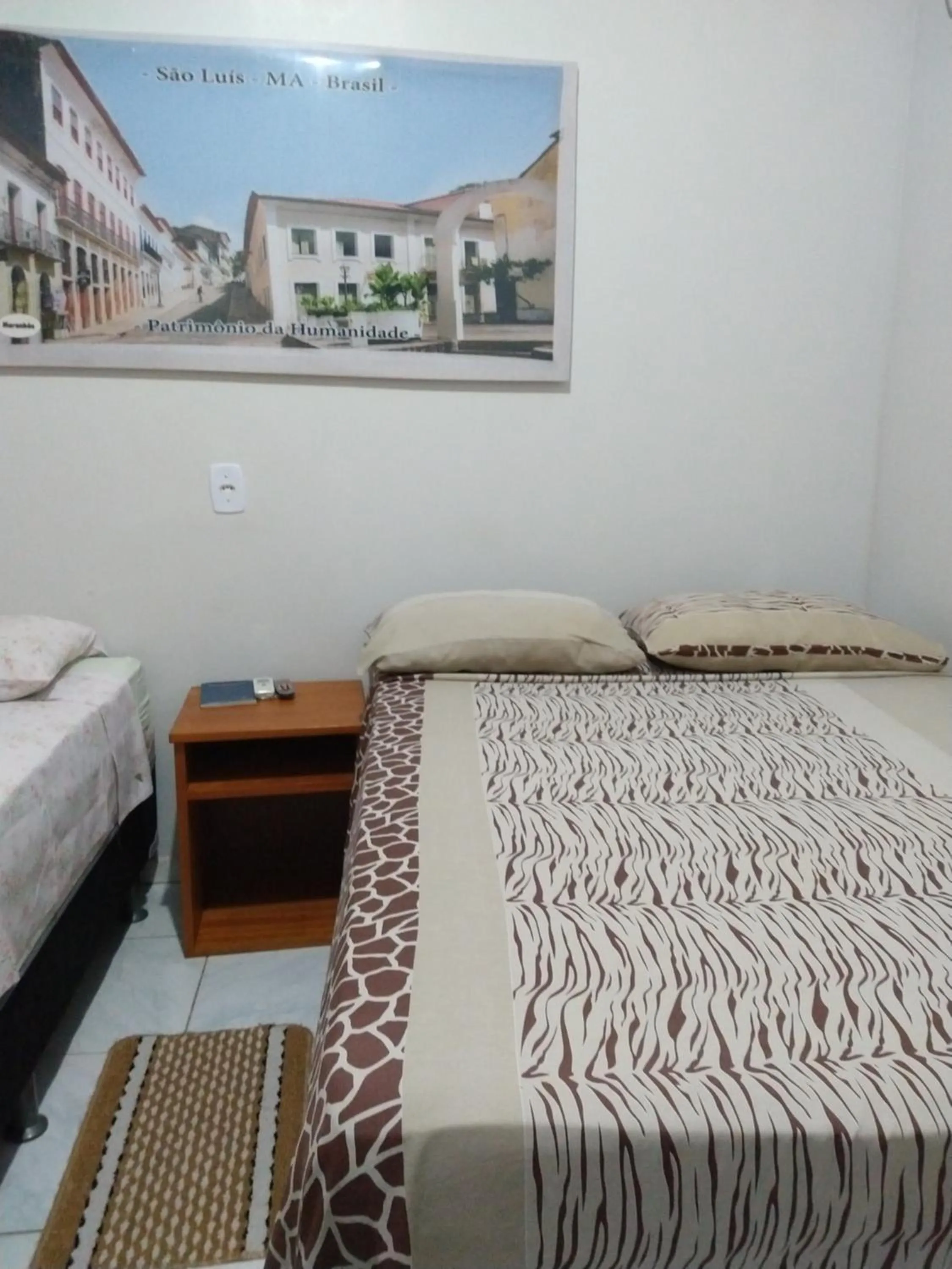 Bed in Pousada Jatobá
