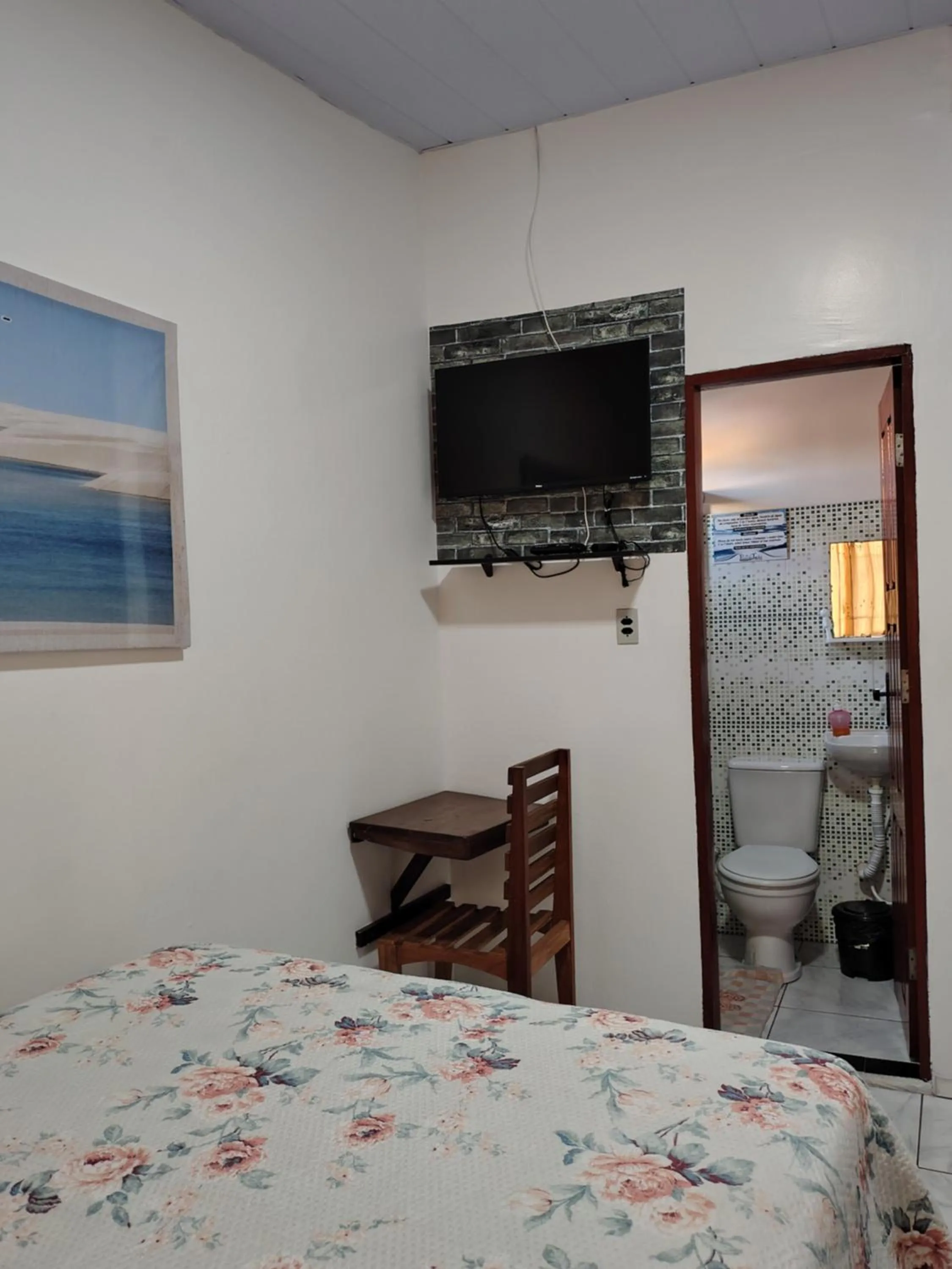 TV and multimedia, Bed in Pousada Jatobá