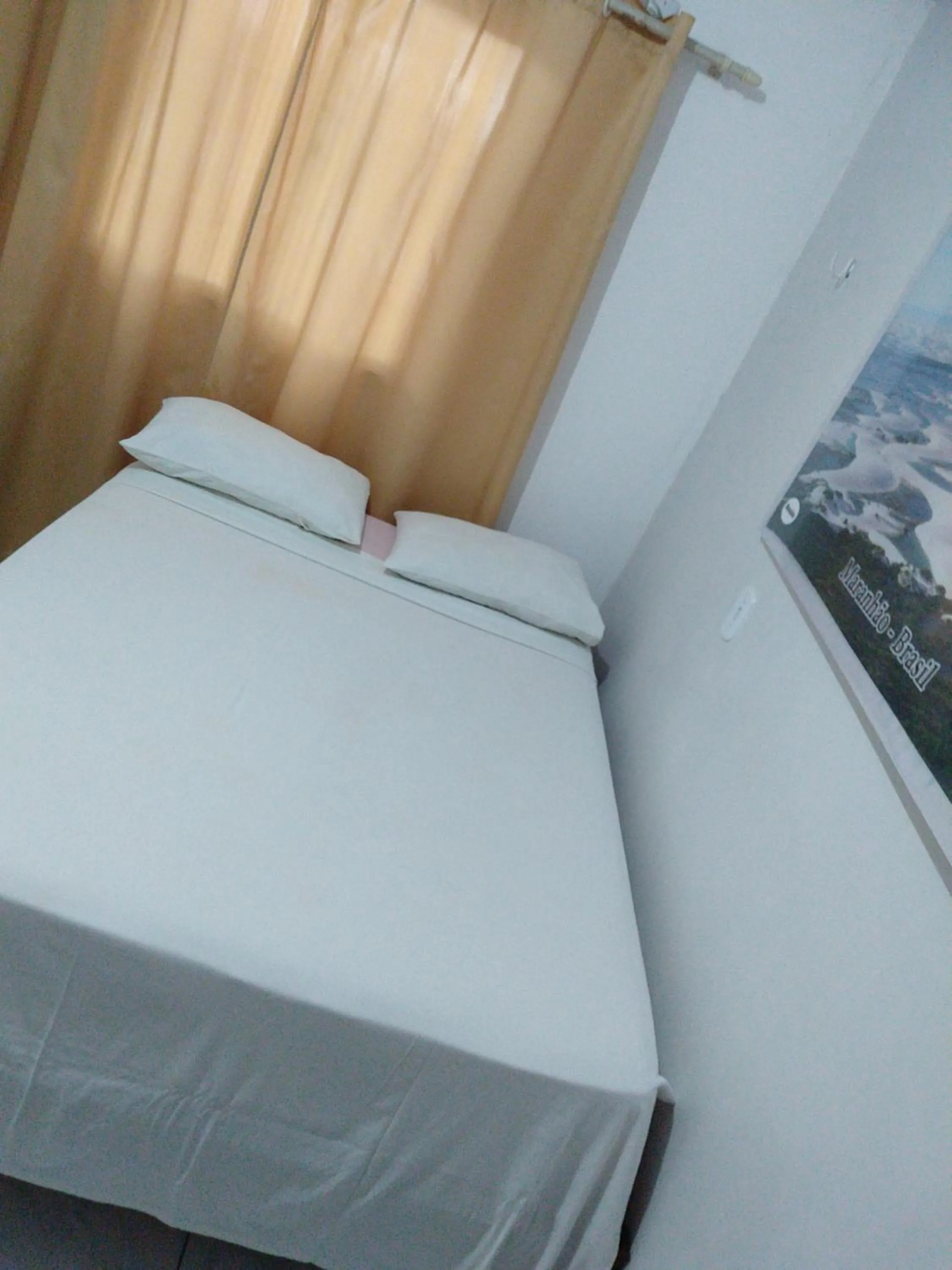 Bed in Pousada Jatobá