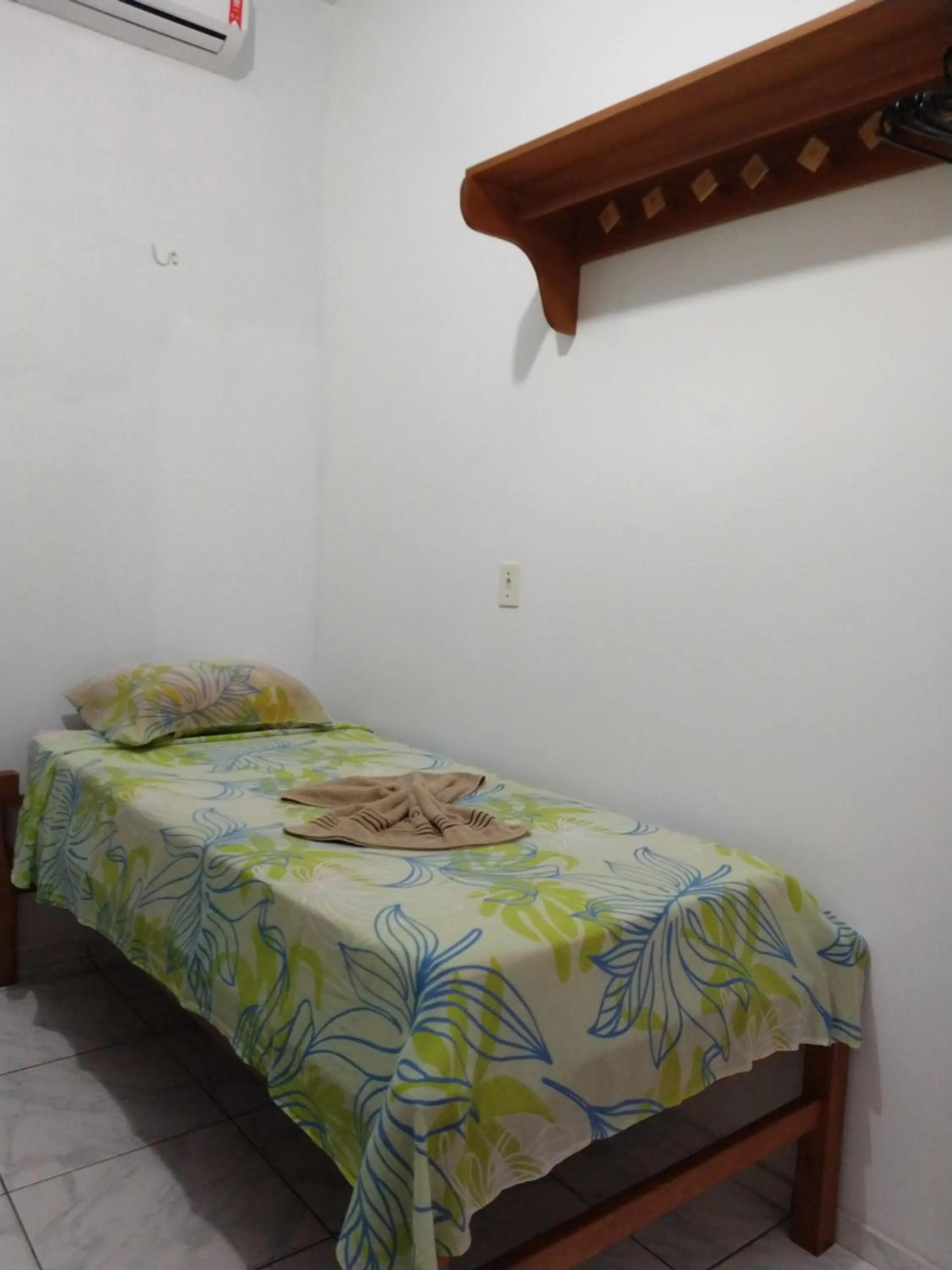 Bed in Pousada Jatobá