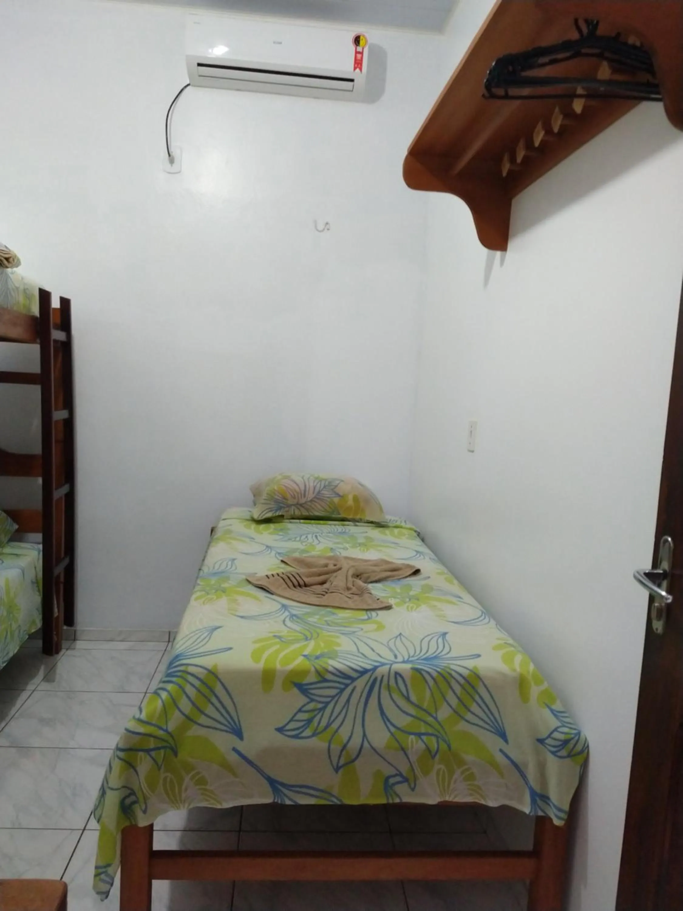 Bed in Pousada Jatobá