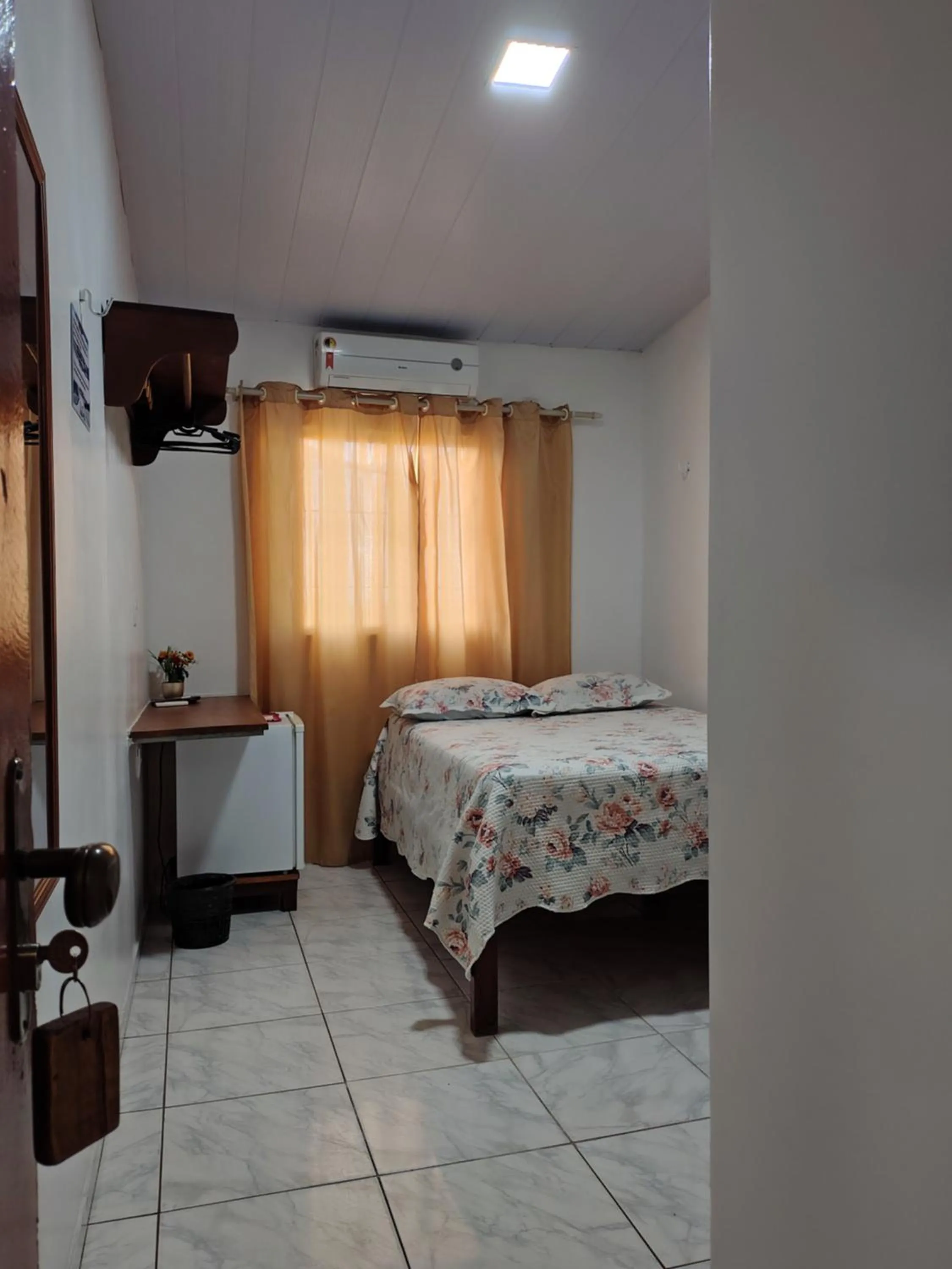 Photo of the whole room, Bed in Pousada Jatobá