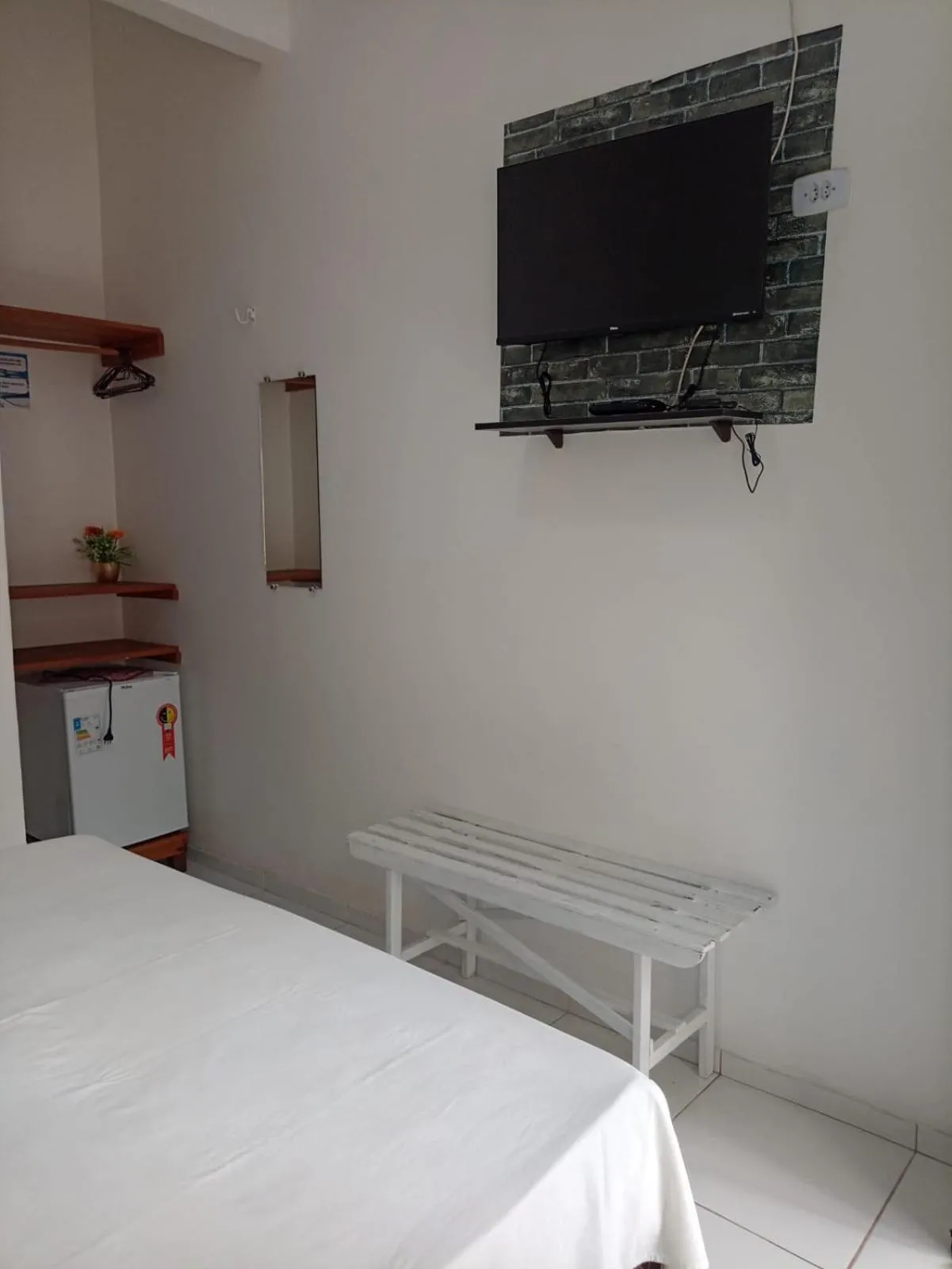 TV and multimedia, Bed in Pousada Jatobá