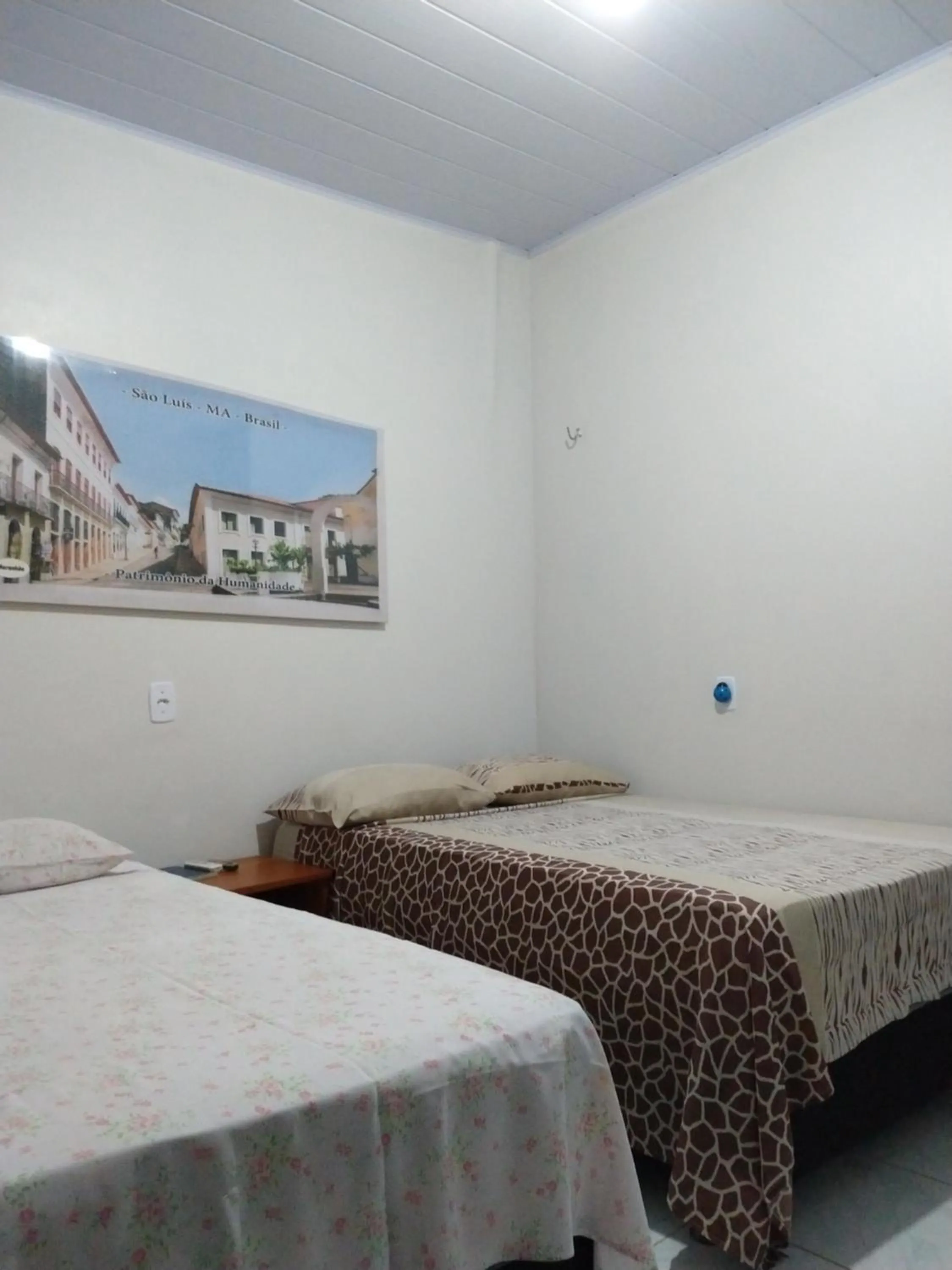 Photo of the whole room, Bed in Pousada Jatobá