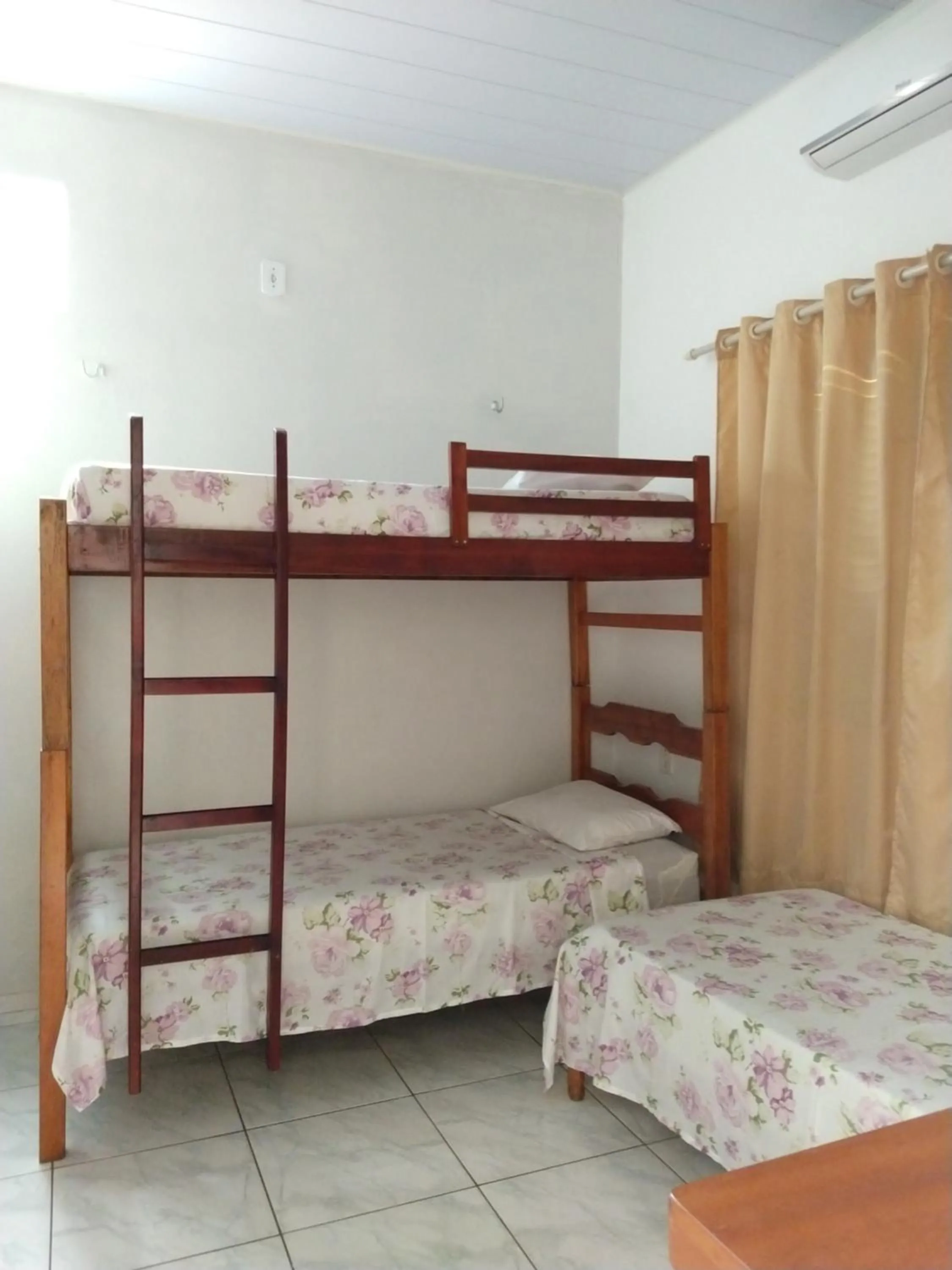 Bed in Pousada Jatobá