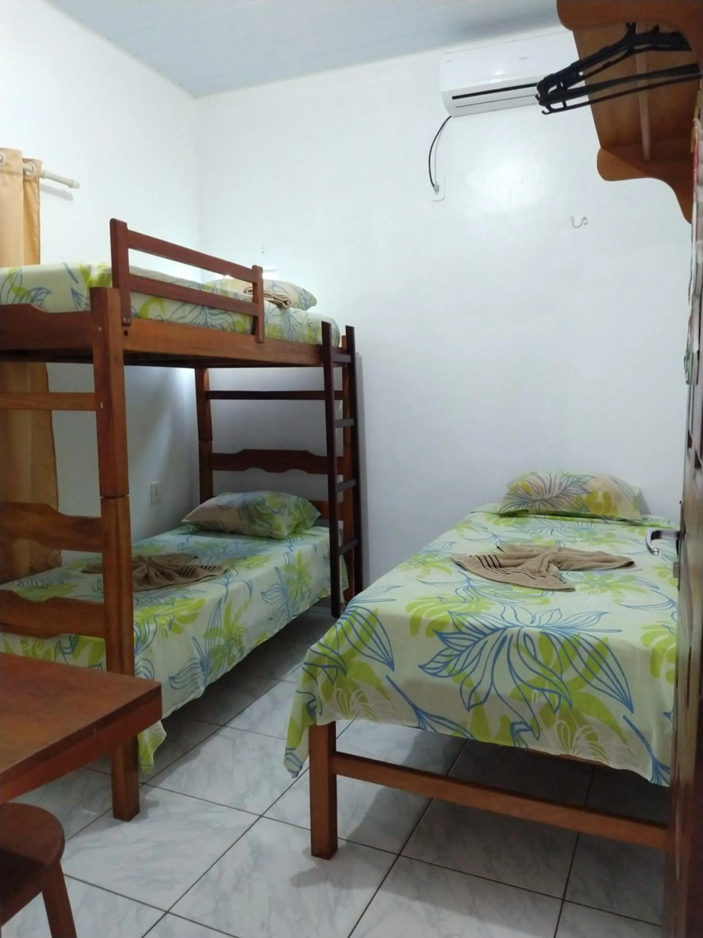 Bed in Pousada Jatobá