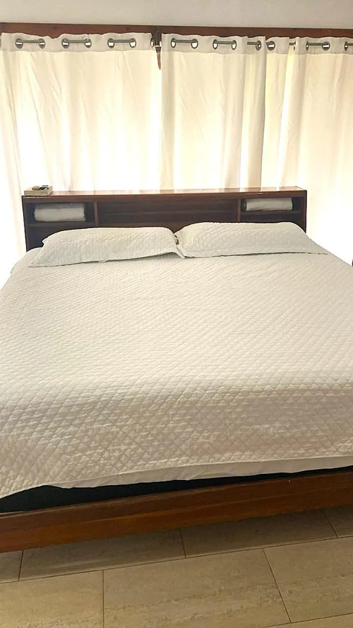 Bed in Coconut Tree West Bay