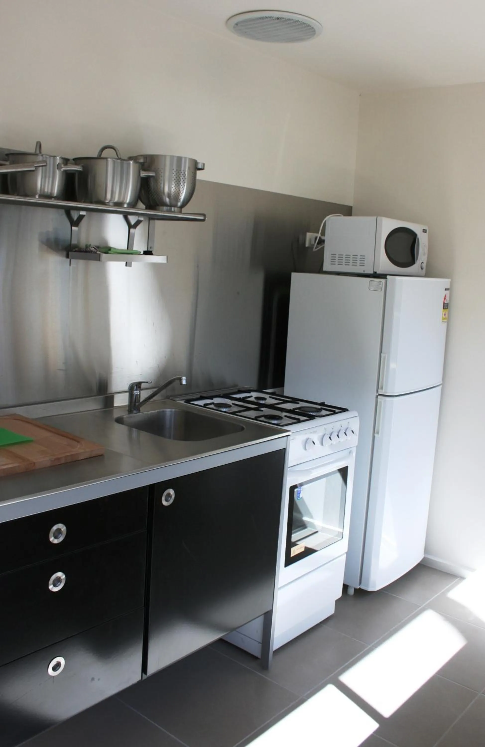 Kitchen or kitchenette in Craggy Peaks Wilderness Cabins