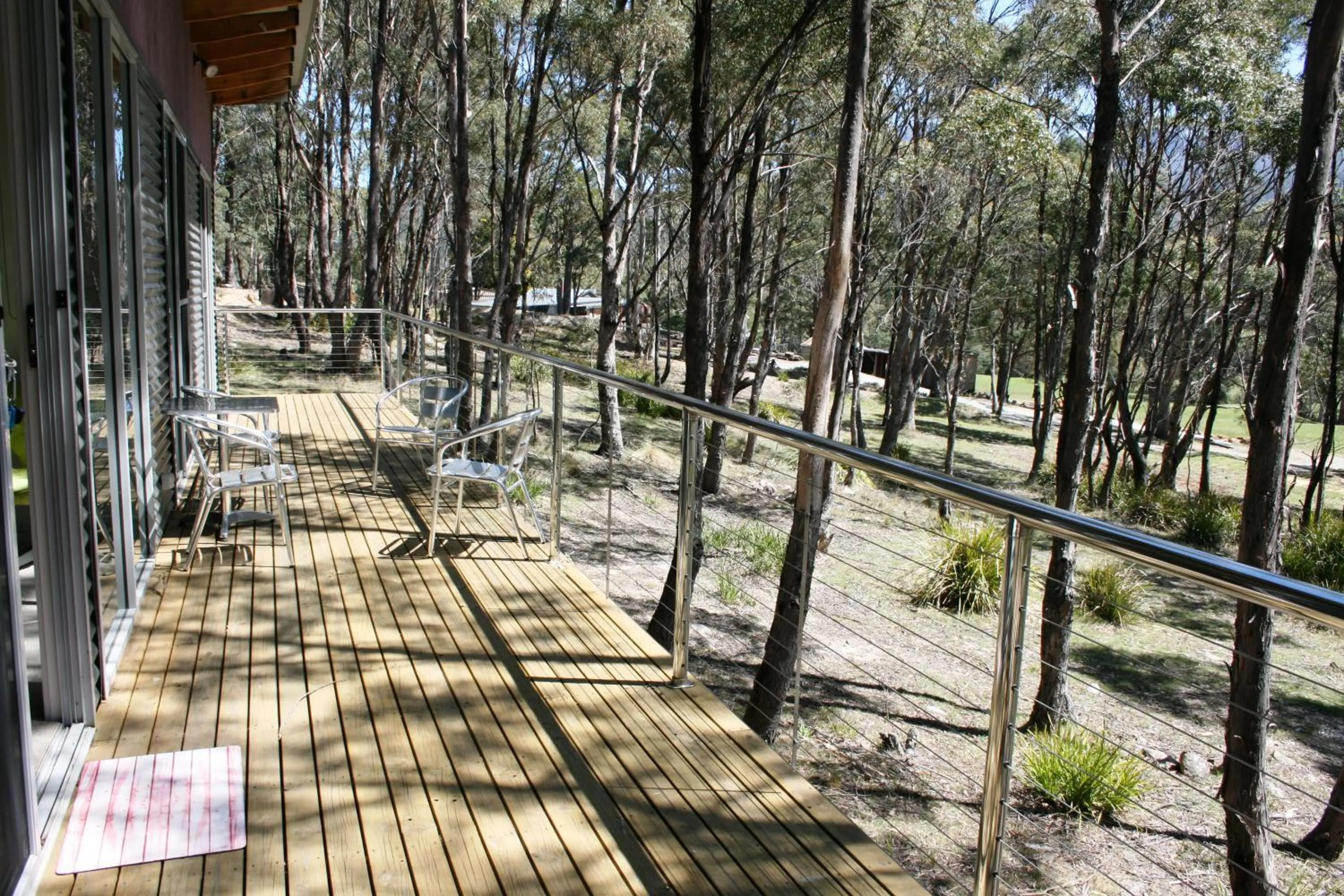 Balcony/Terrace in Craggy Peaks Wilderness Cabins