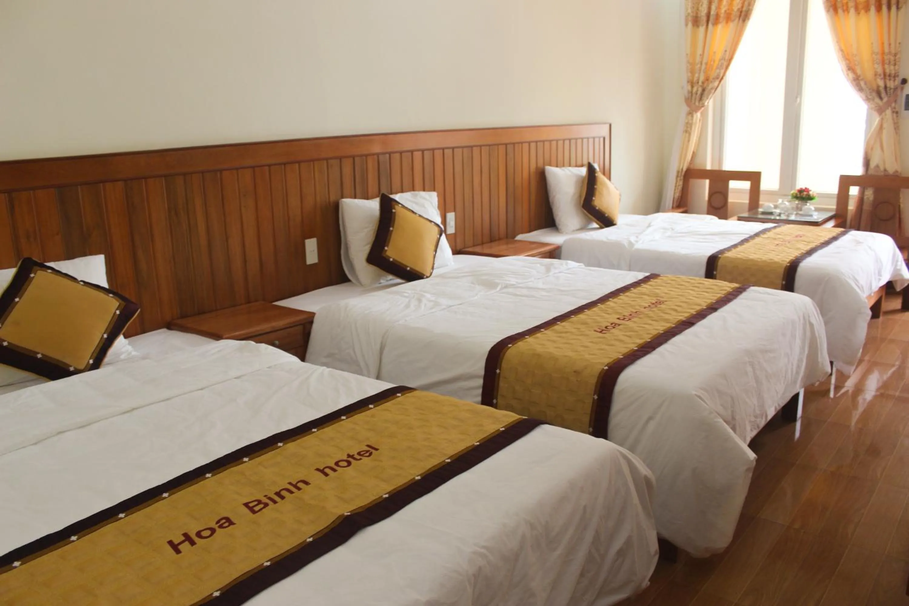 Photo of the whole room, Bed in Hoa Binh Hotel