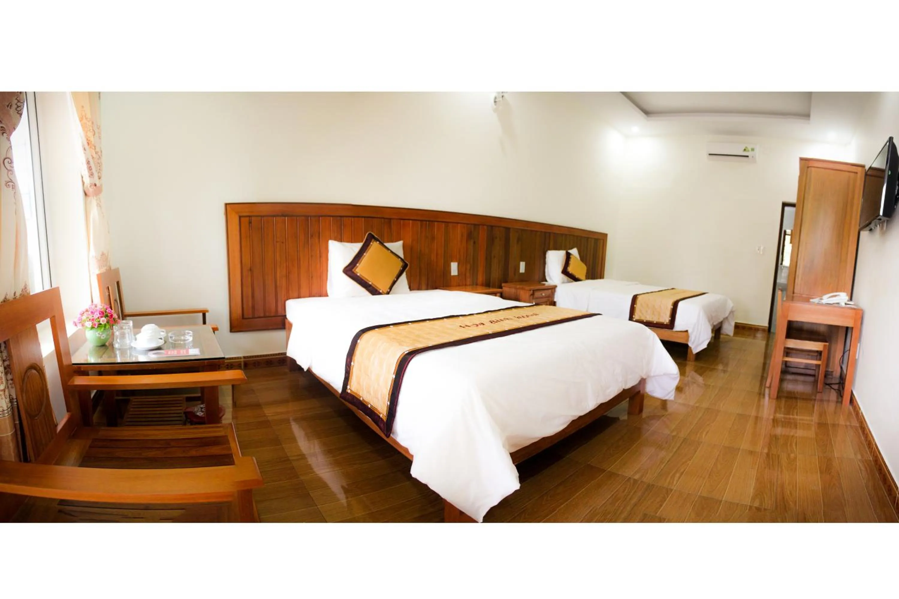 Photo of the whole room, Bed in Hoa Binh Hotel