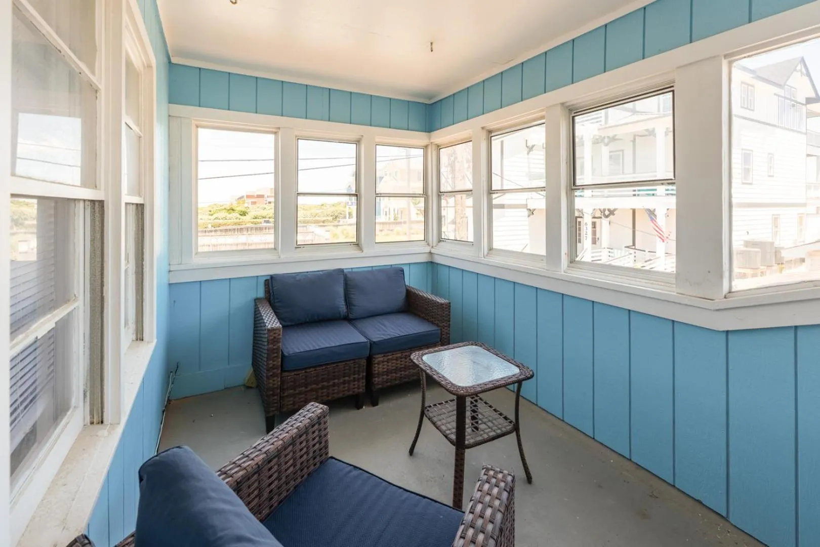 Seating area in Oceanside Court by KEES Vacations