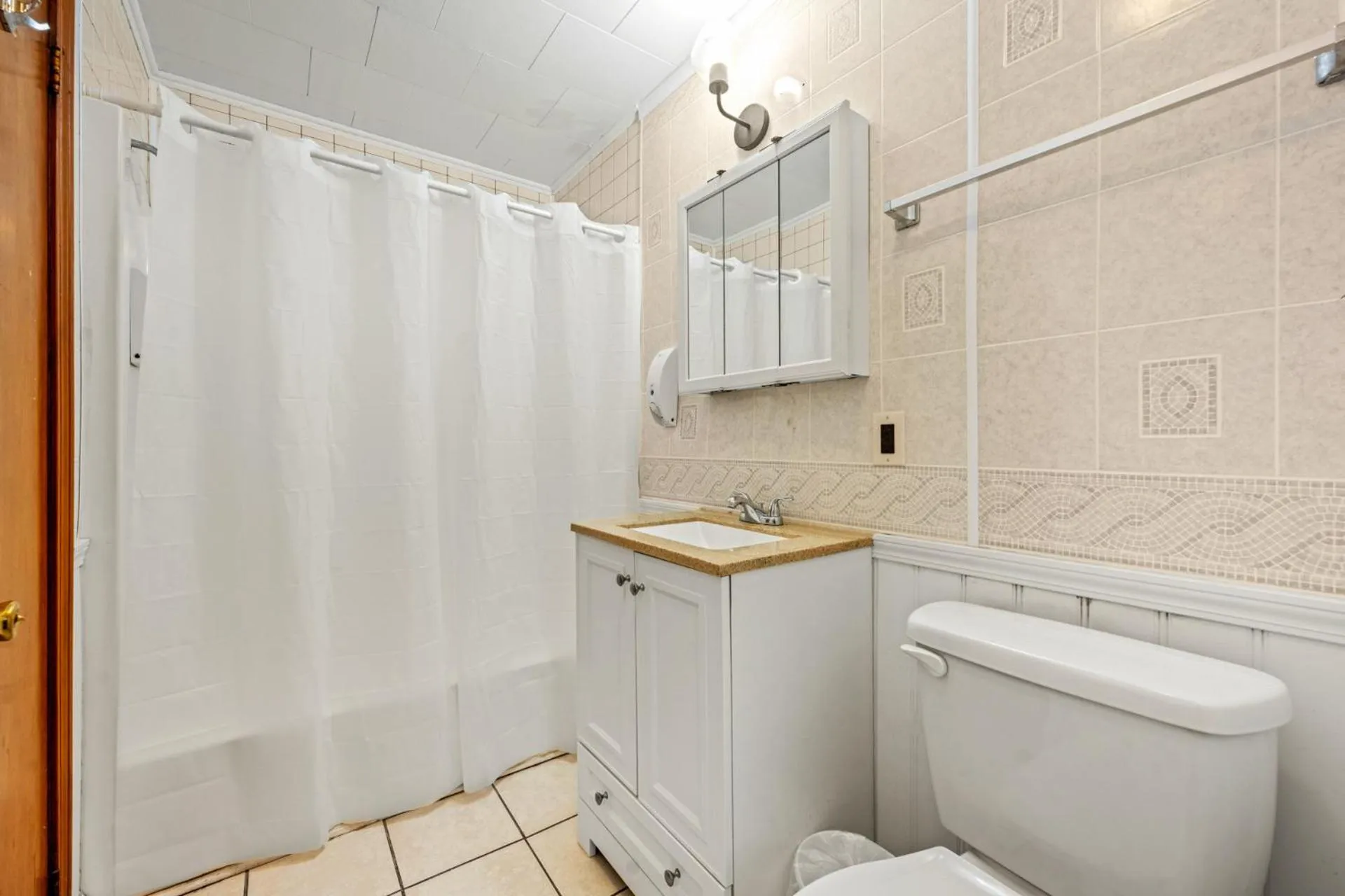 Bathroom in Oceanside Court by KEES Vacations