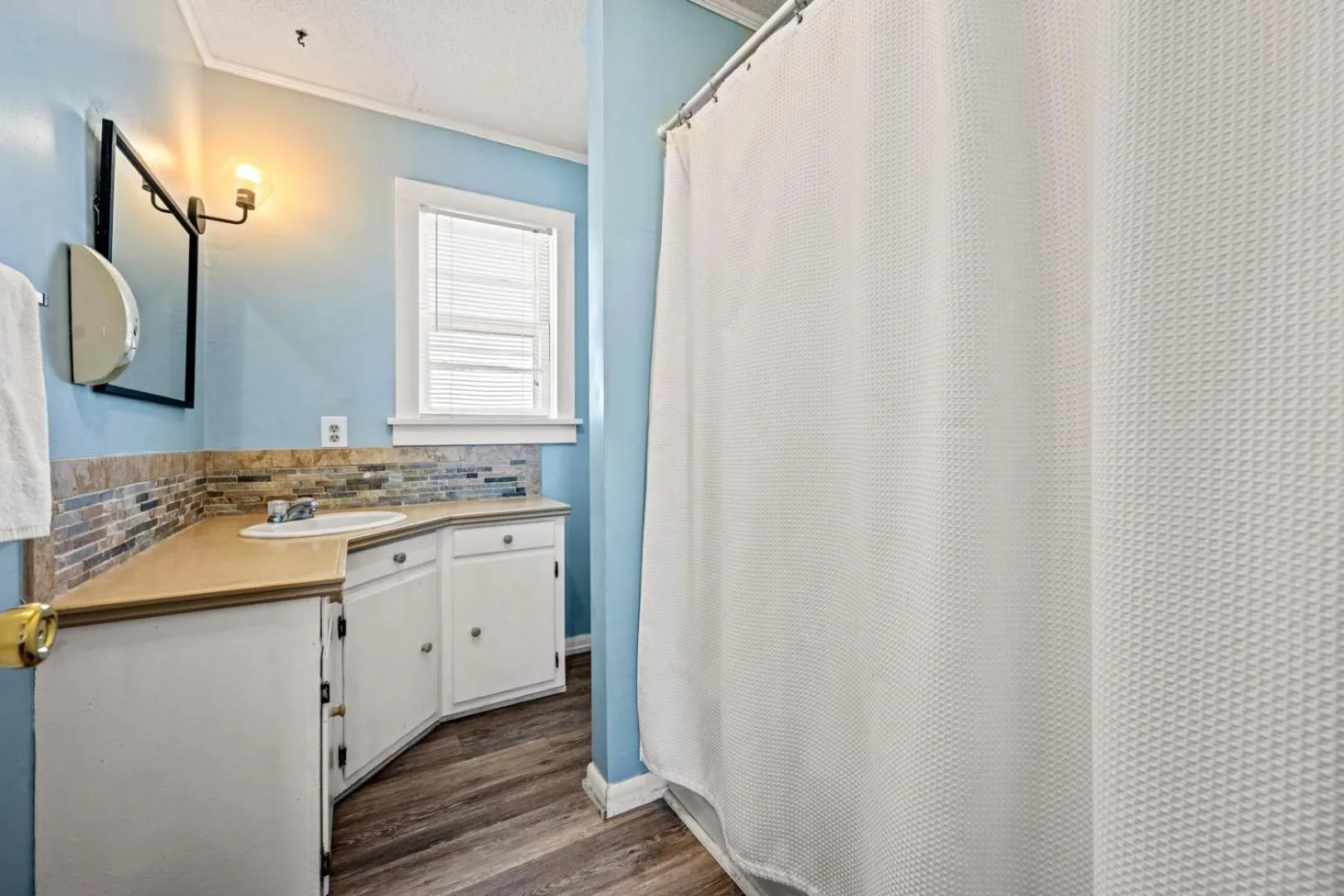 Bathroom in Oceanside Court by KEES Vacations