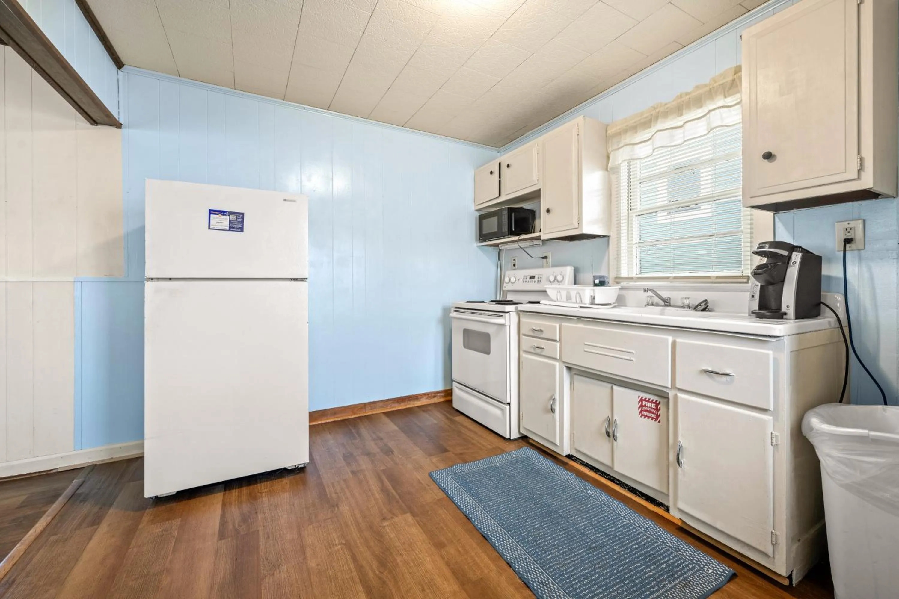 Kitchen or kitchenette in Oceanside Court by KEES Vacations