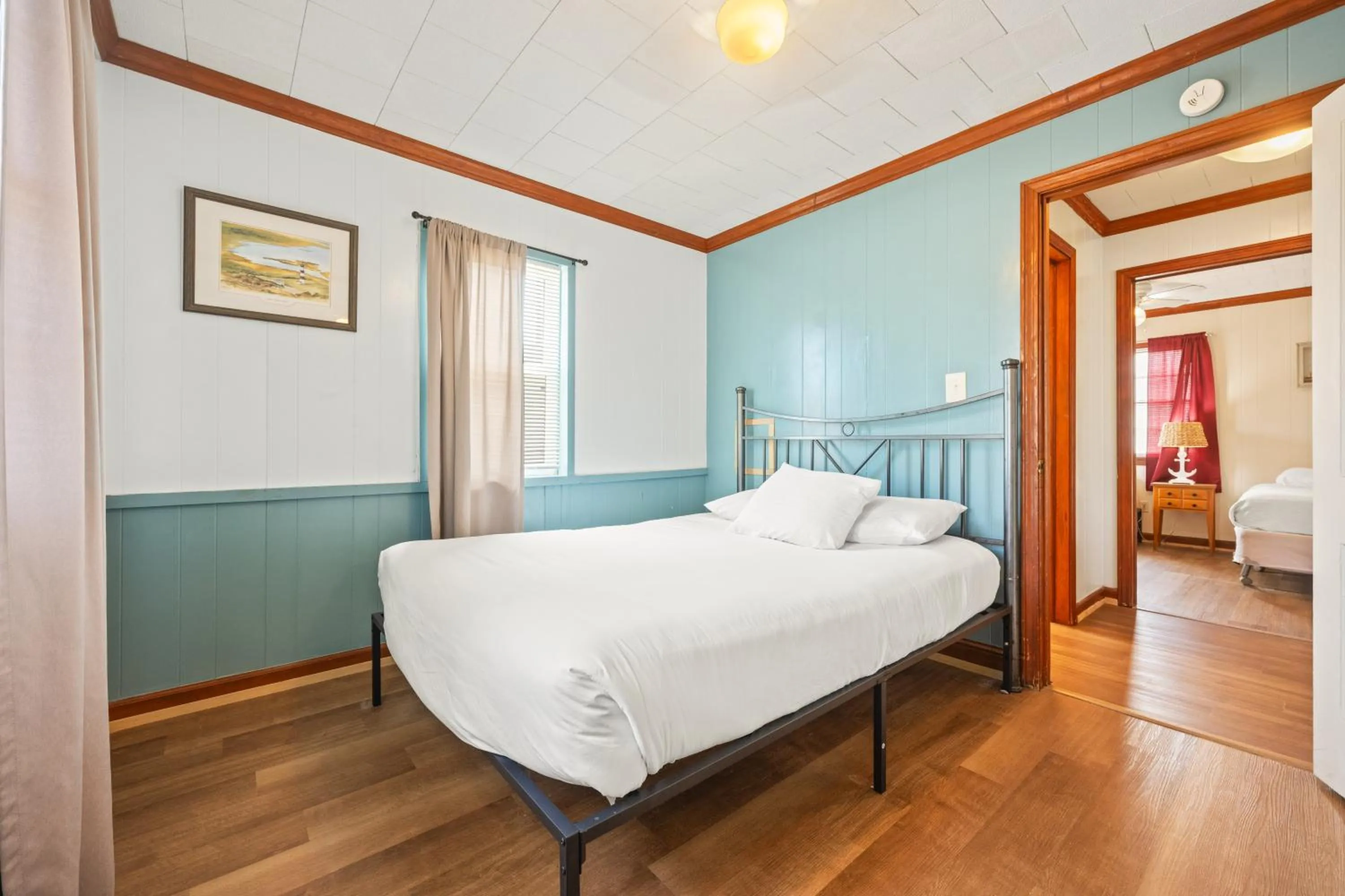 Bed in Oceanside Court by KEES Vacations