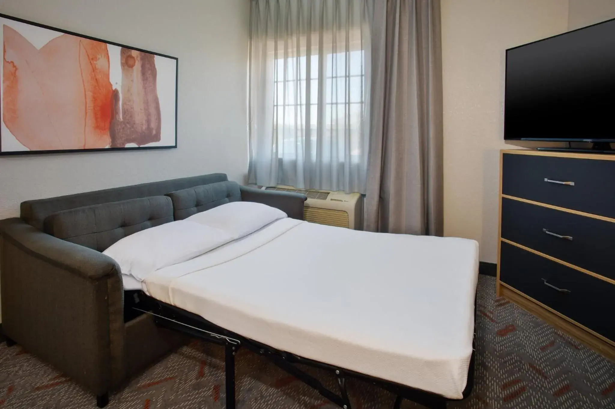 Photo of the whole room, Bed in Candlewood Suites Kenosha - Pleasant Prairie by IHG Photo of the whole room, Bed in Candlewood Suites Kenosha - Pleasant Prairie by IHG