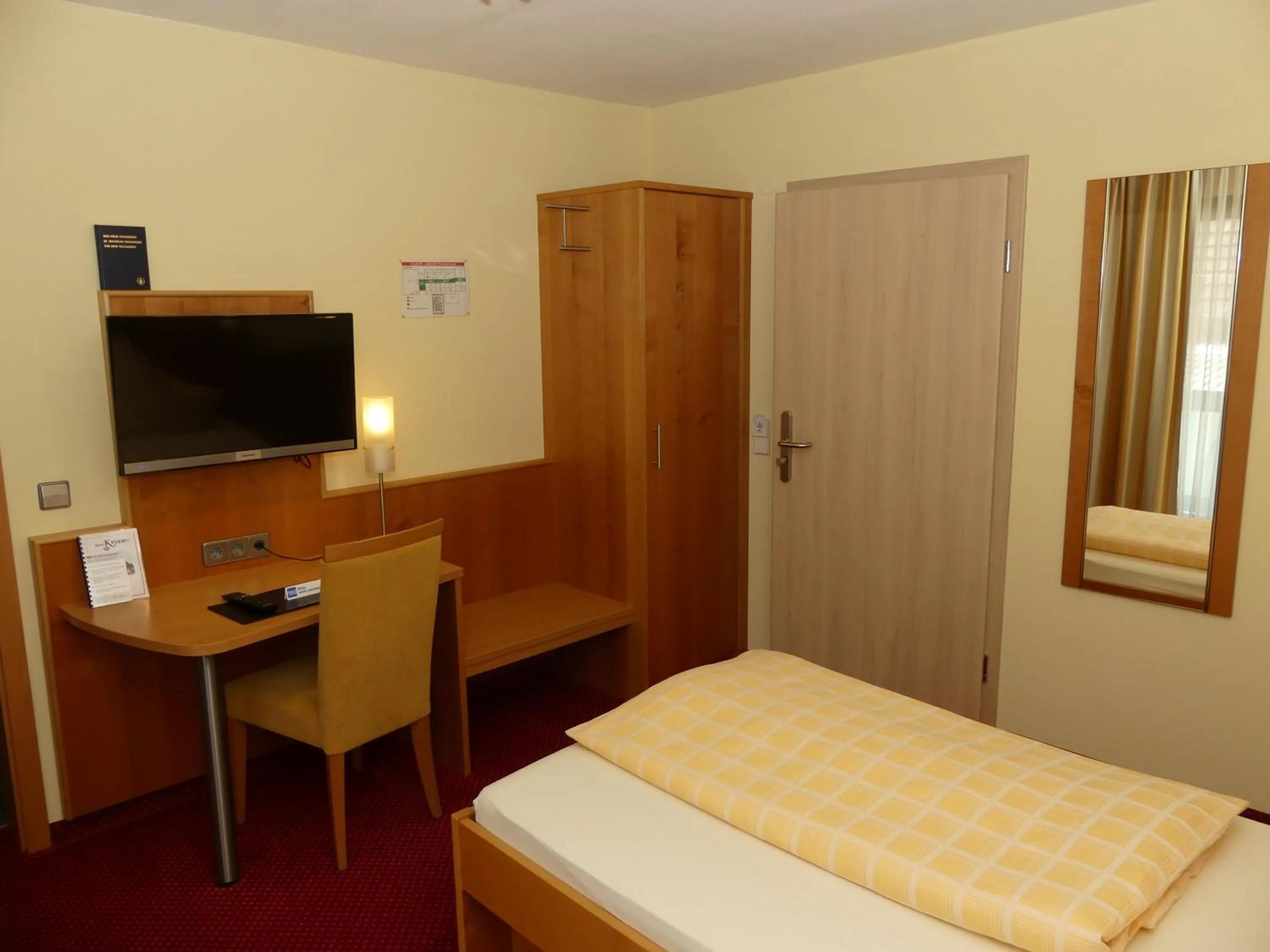 Photo of the whole room, Bed in Hotel KRONE Garni