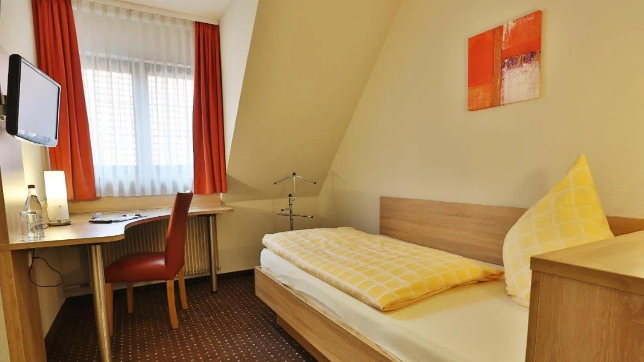 Photo of the whole room, Bed in Hotel KRONE Garni