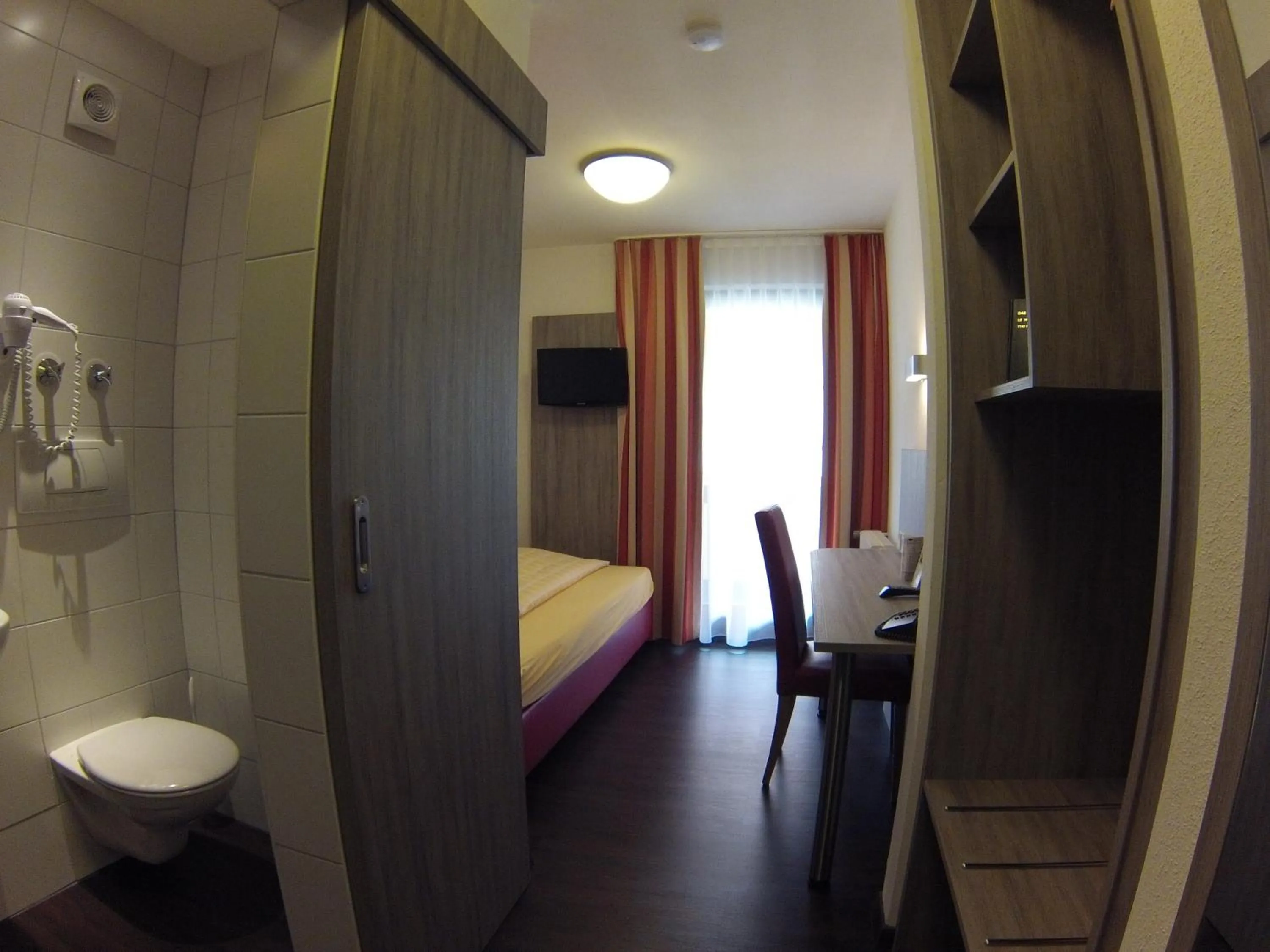 Photo of the whole room, Bed in Hotel KRONE Garni