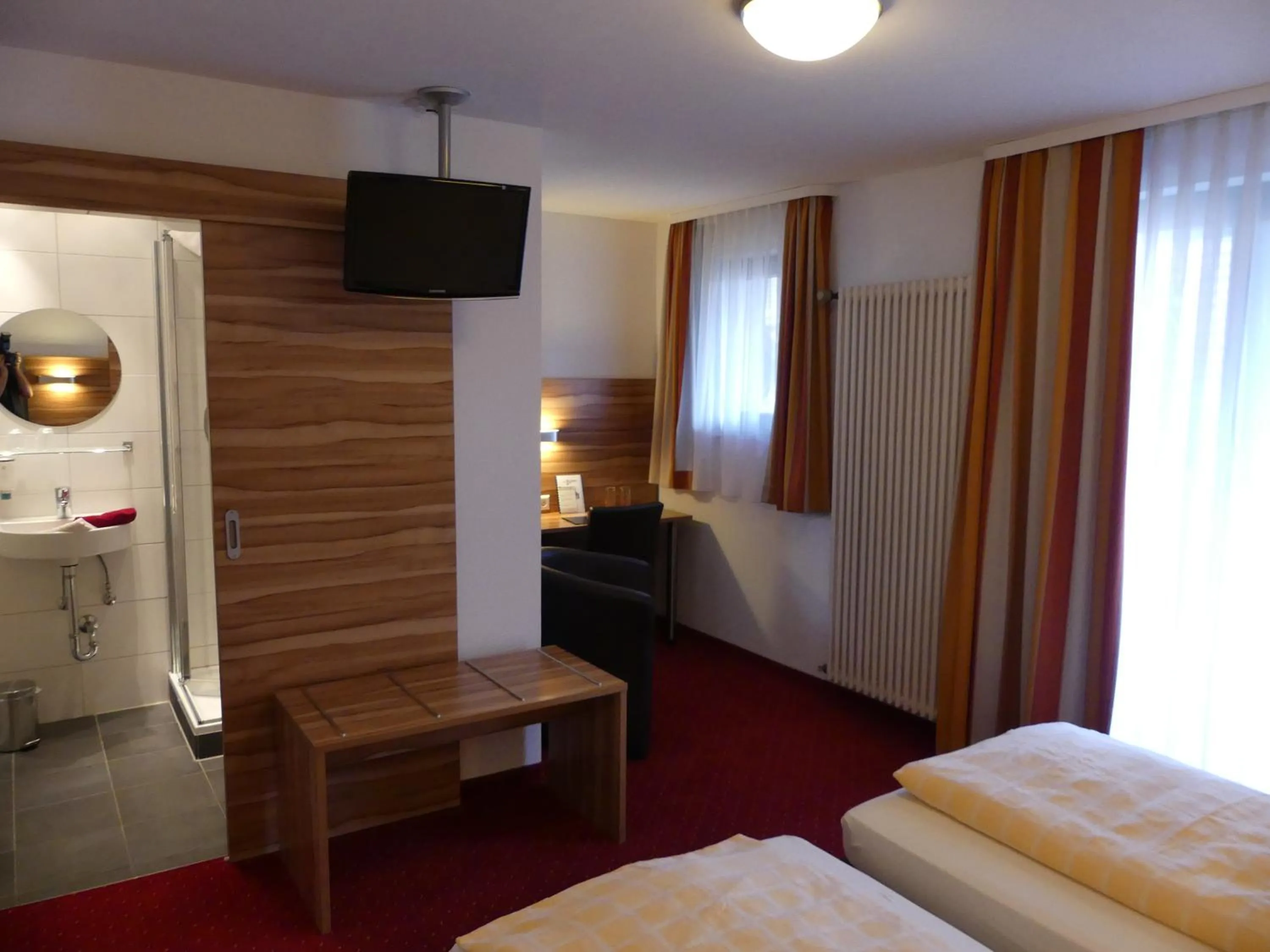 Photo of the whole room, Bed in Hotel KRONE Garni