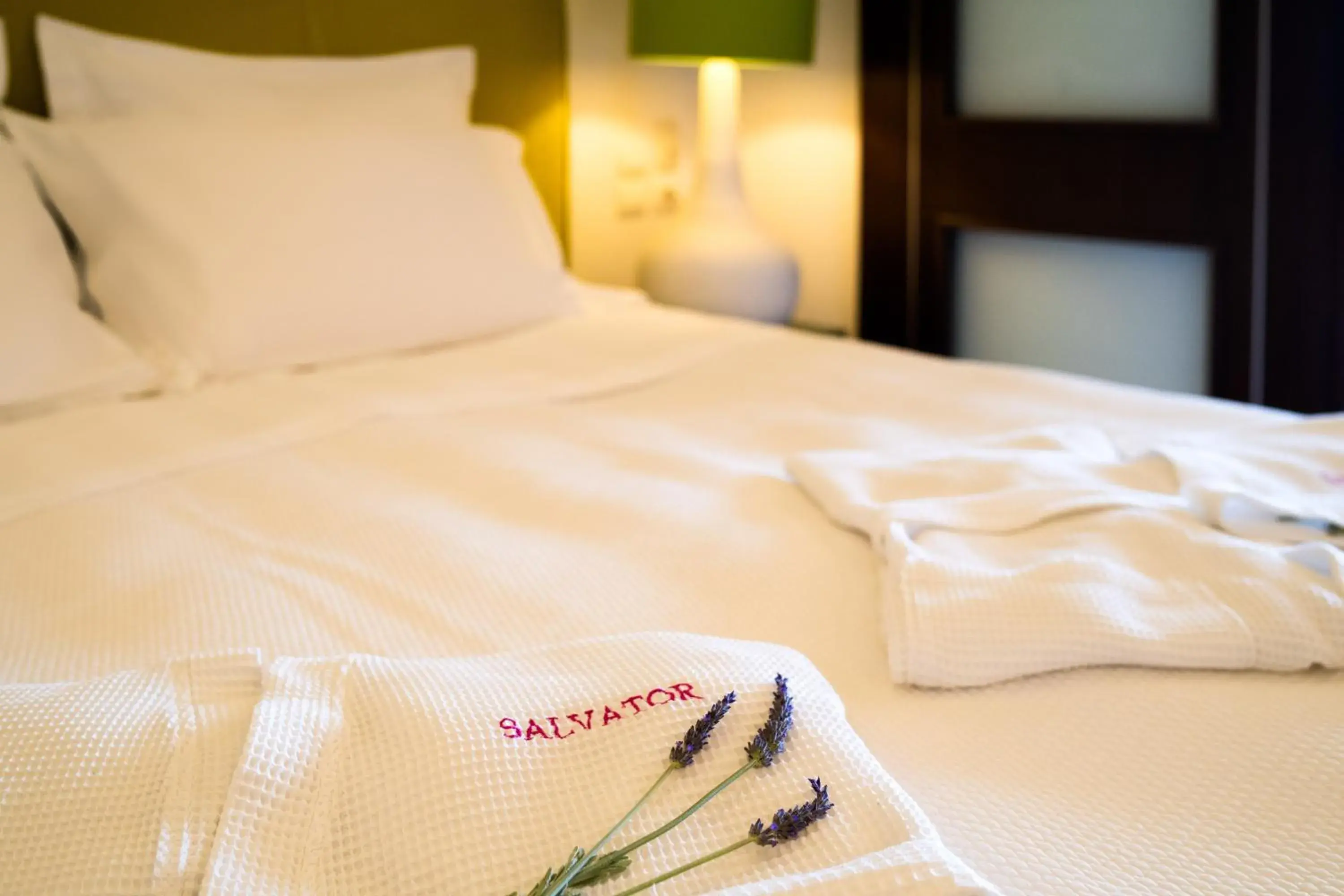 Bed in Salvator Villas & Spa Hotel Bed in Salvator Villas & Spa Hotel