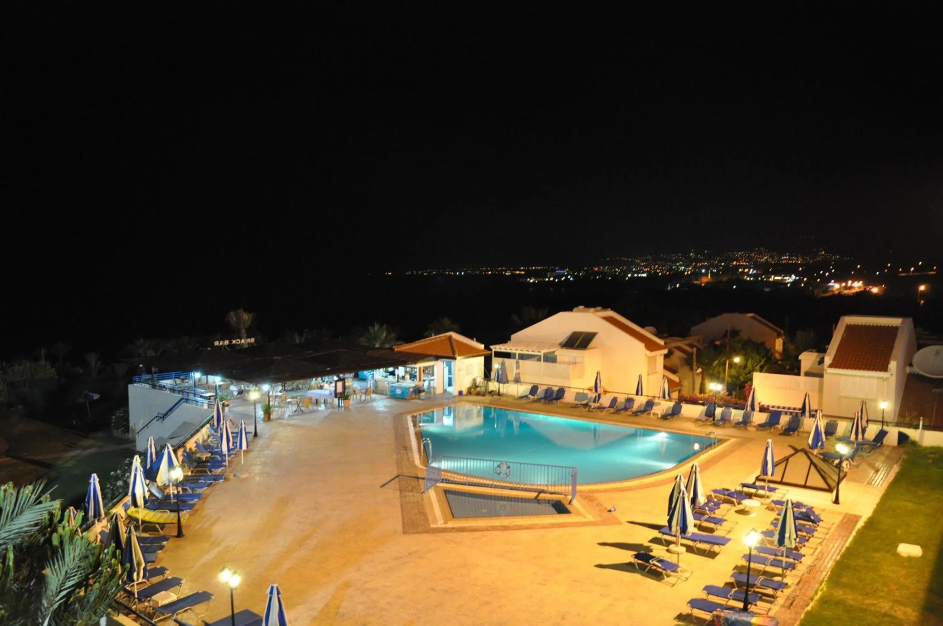Swimming pool in Helios Bay Hotel and Suites