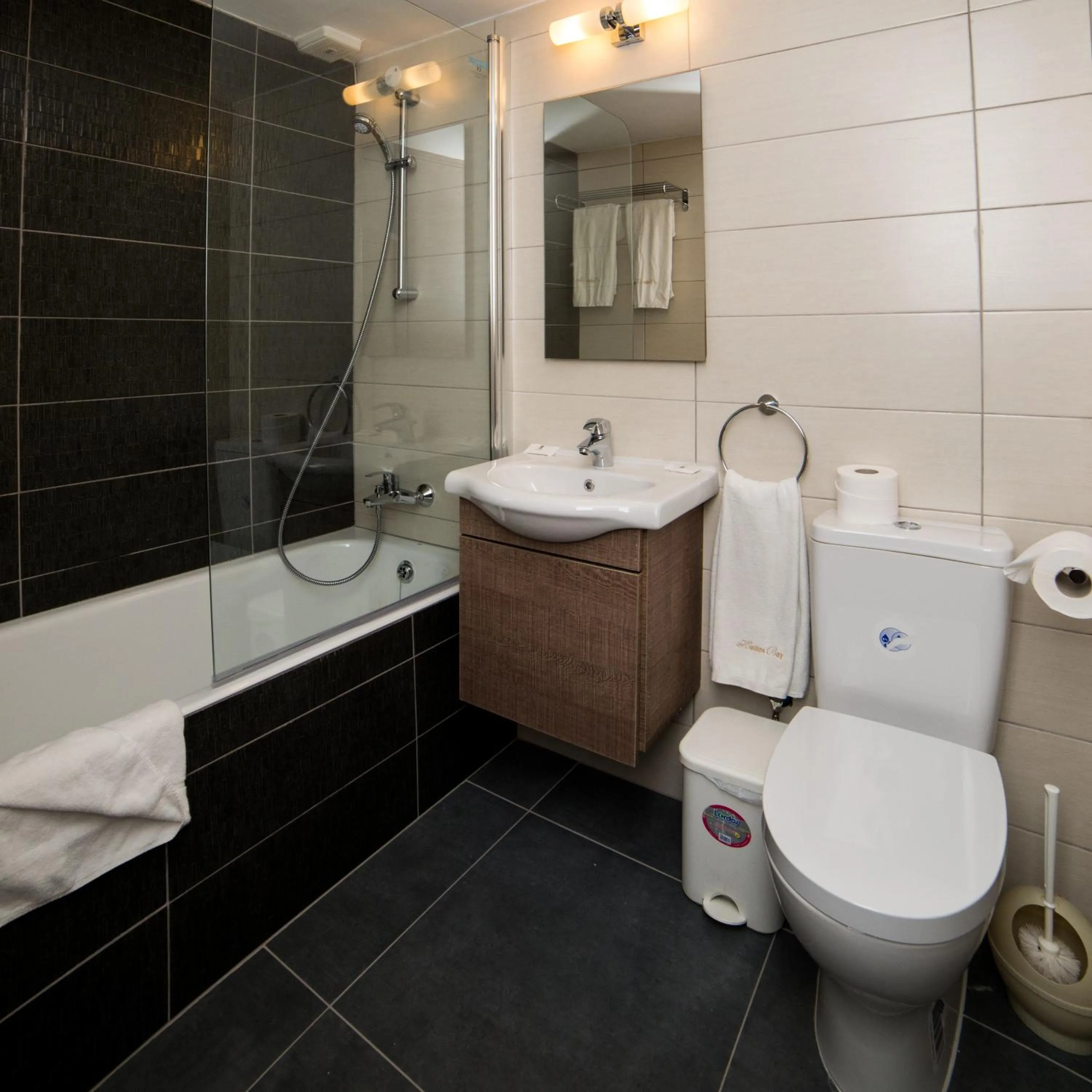 Bathroom in Helios Bay Hotel and Suites