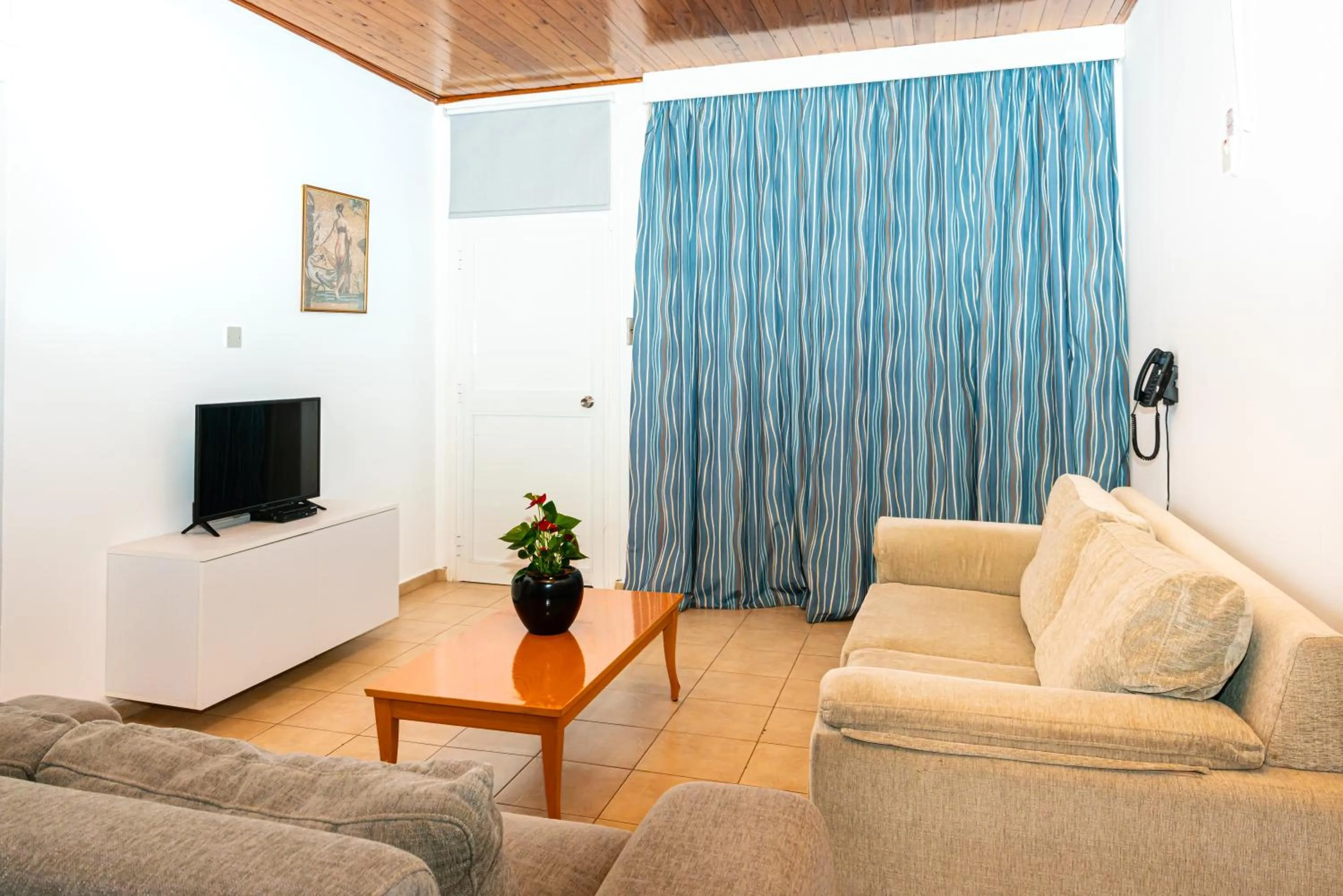 Living room in Helios Bay Hotel and Suites