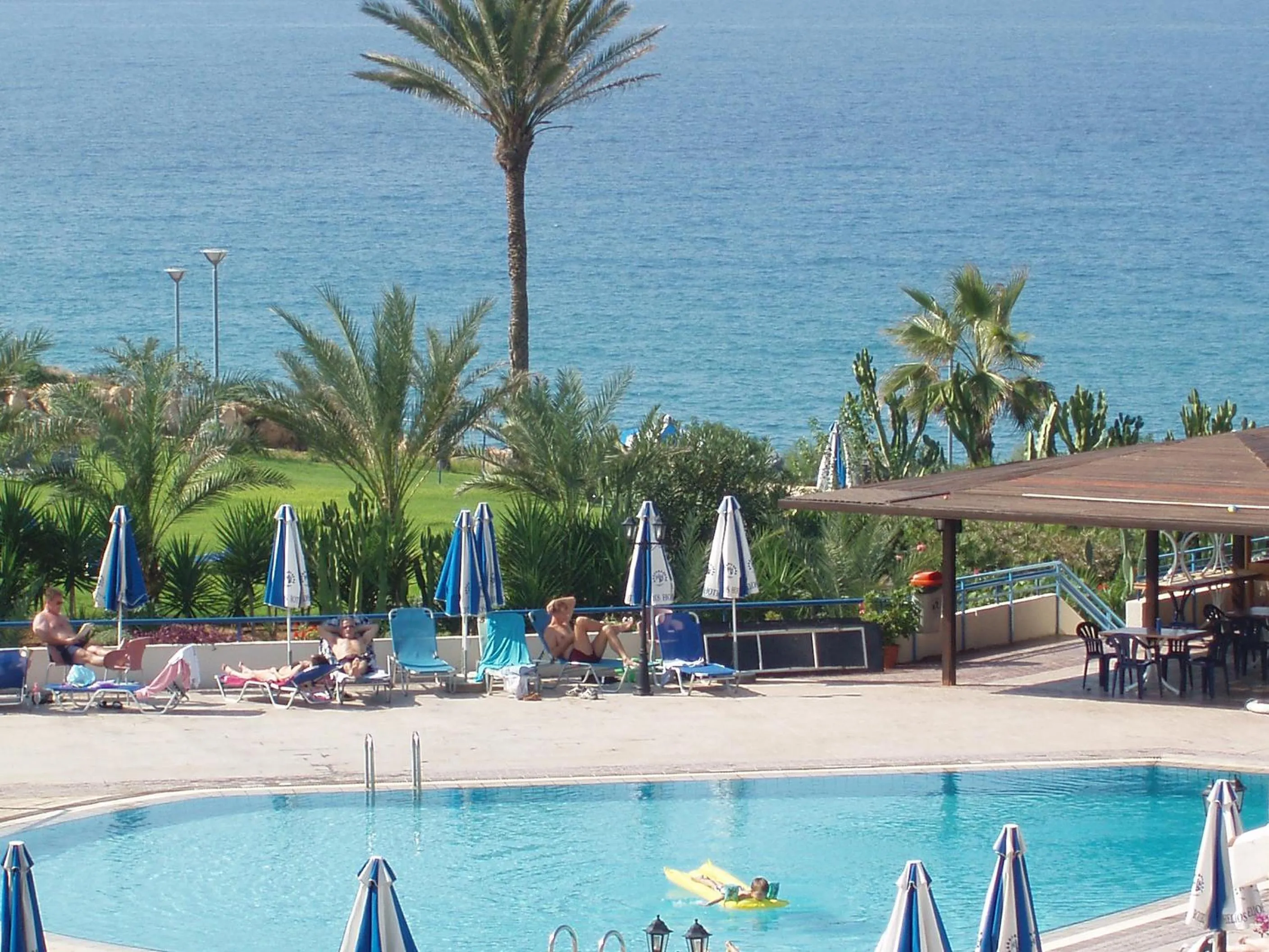 Swimming pool in Helios Bay Hotel and Suites