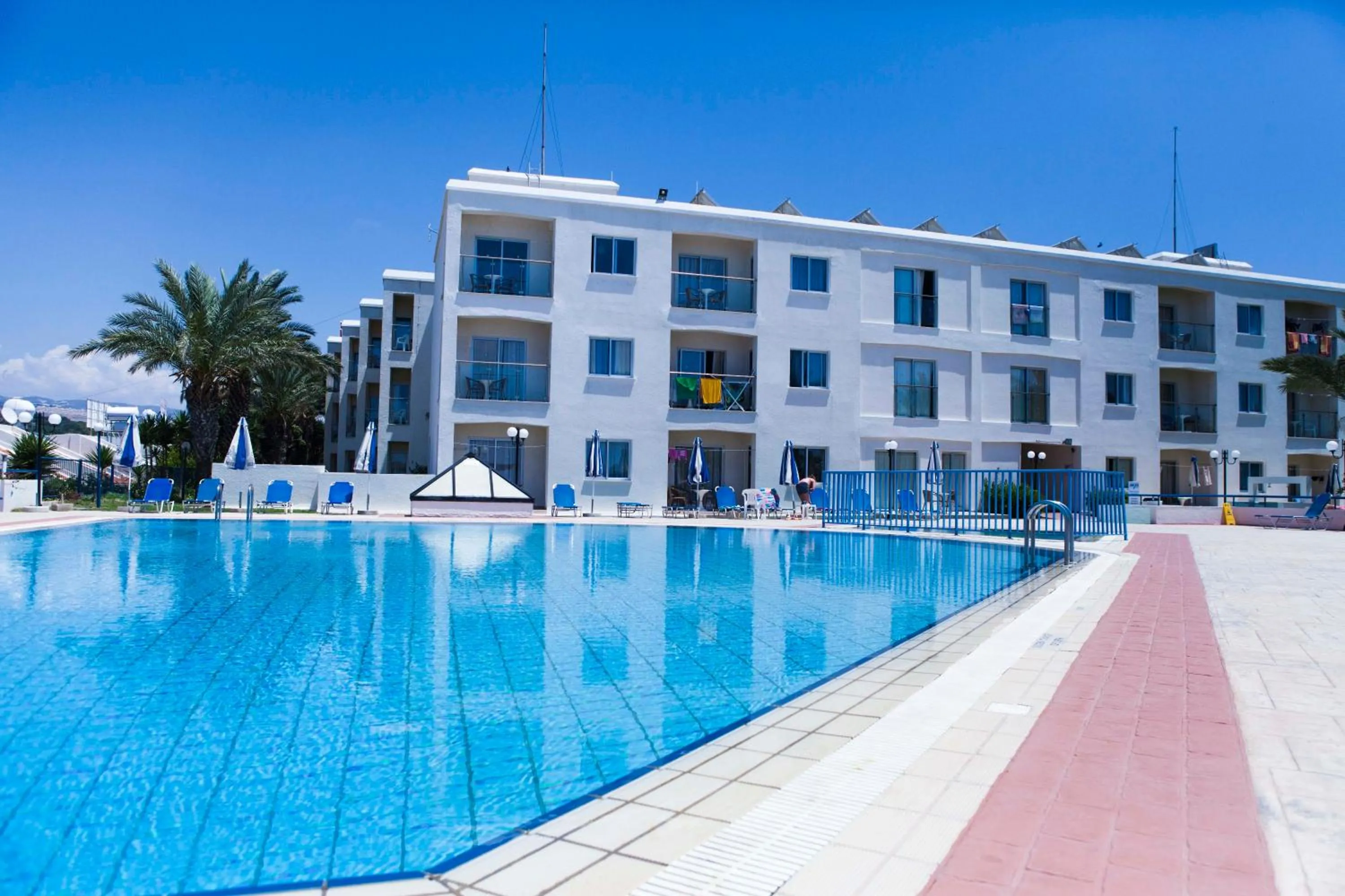 Swimming pool in Helios Bay Hotel and Suites
