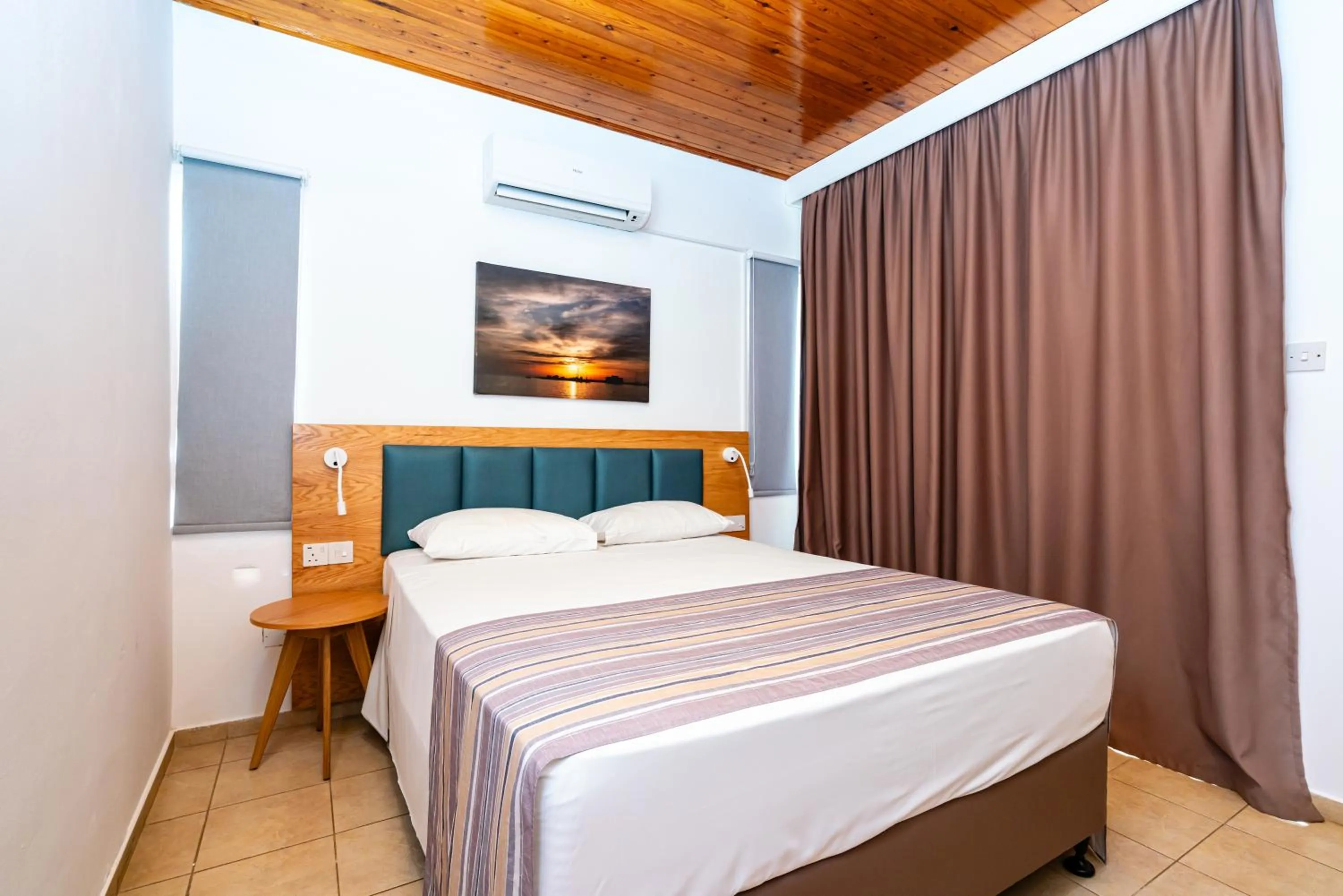 Bedroom, Bed in Helios Bay Hotel and Suites