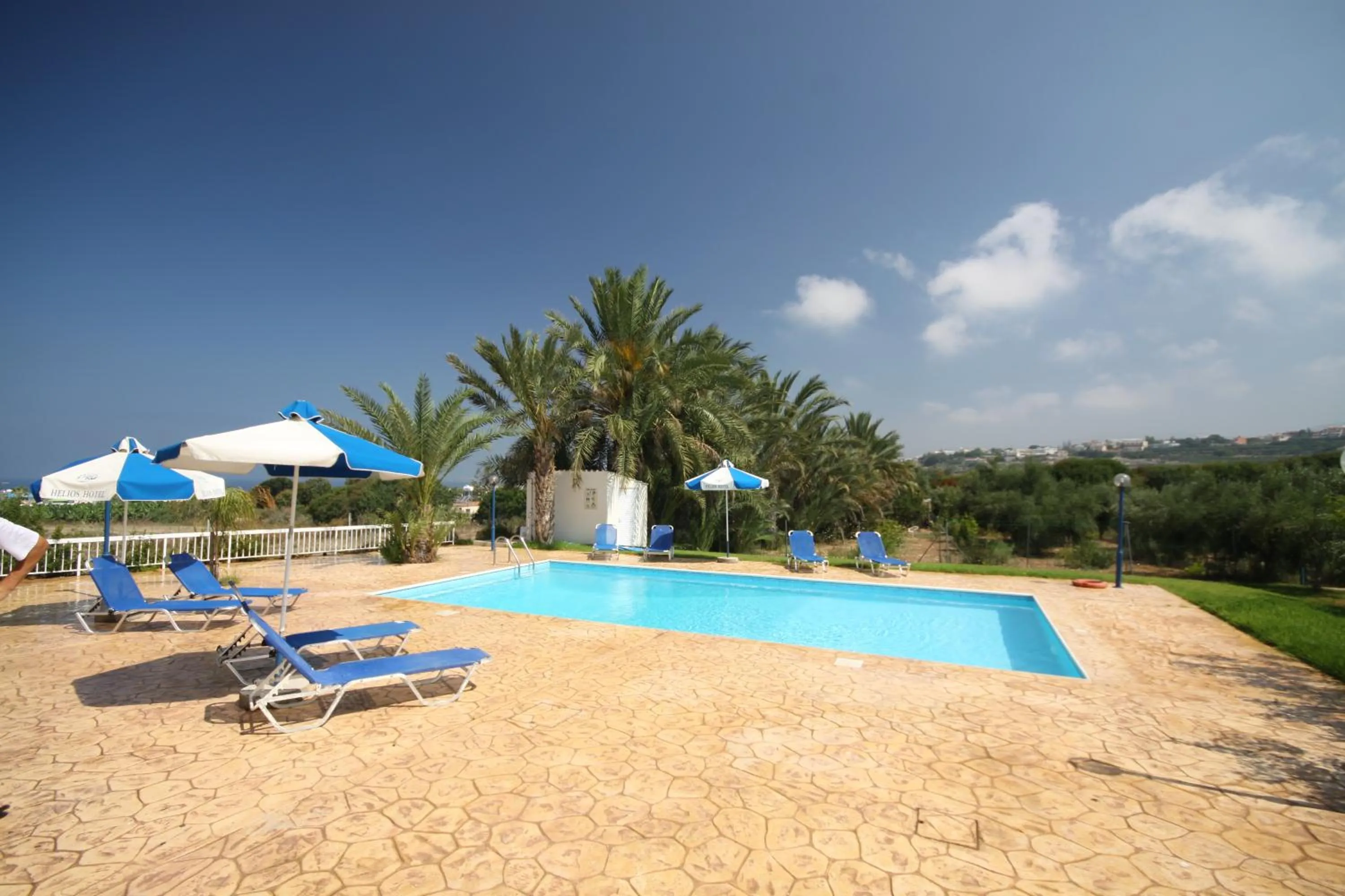 Swimming pool in Helios Bay Hotel and Suites