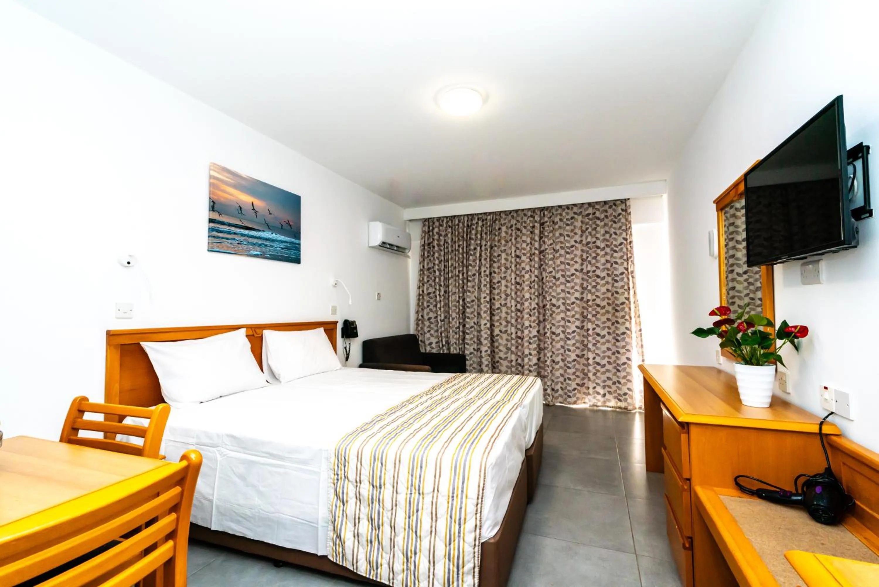 Bedroom, Bed in Helios Bay Hotel and Suites