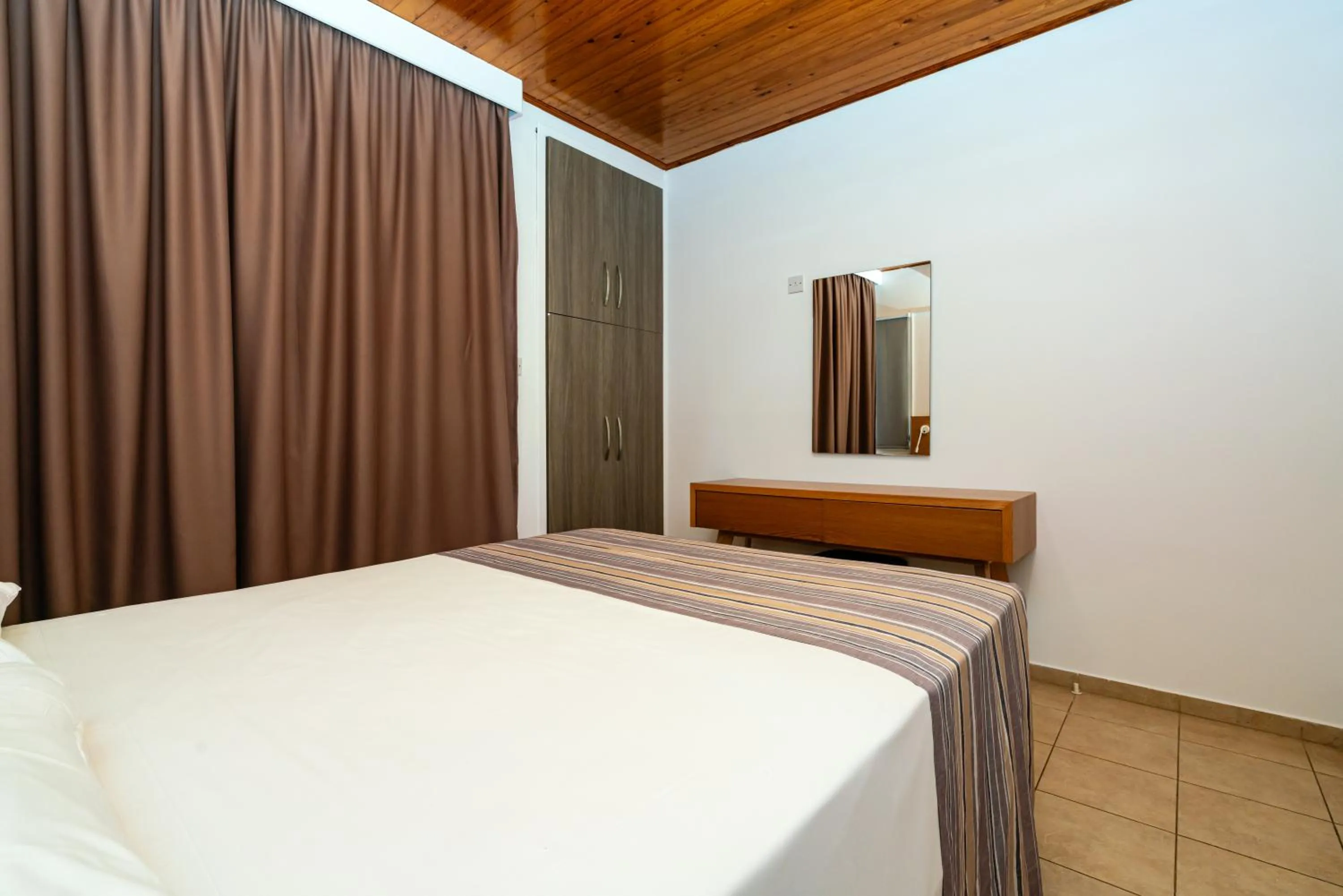 Bedroom, Bed in Helios Bay Hotel and Suites