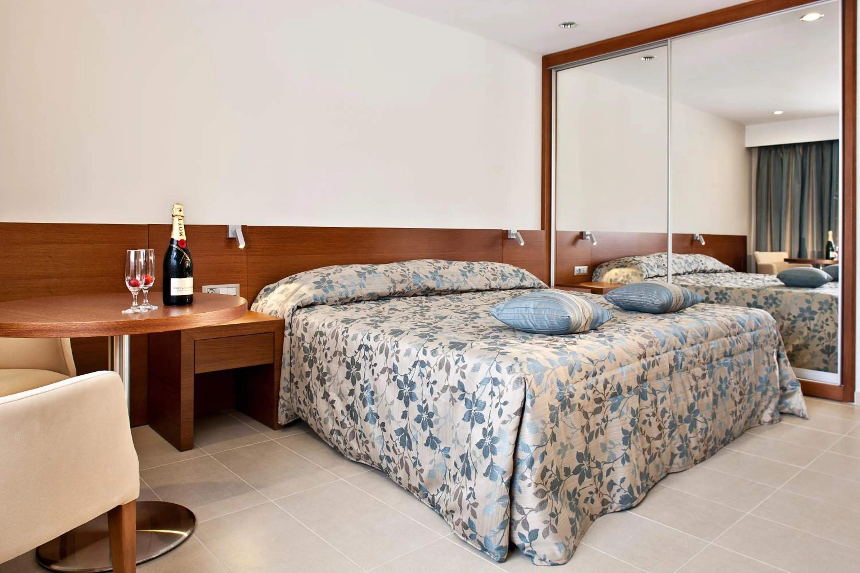 Bed in Apollonion Asterias Resort and Spa
