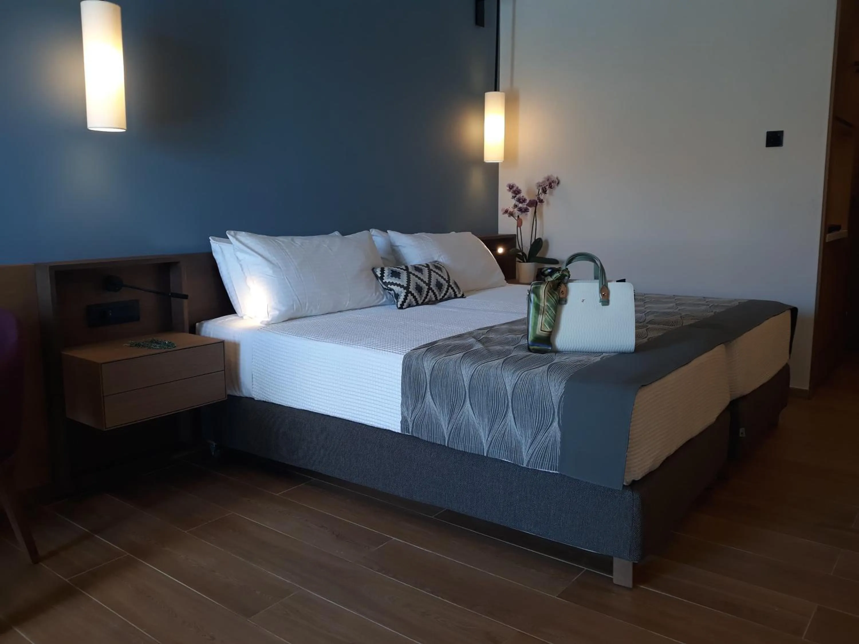 Bedroom, Bed in Apollonion Asterias Resort and Spa