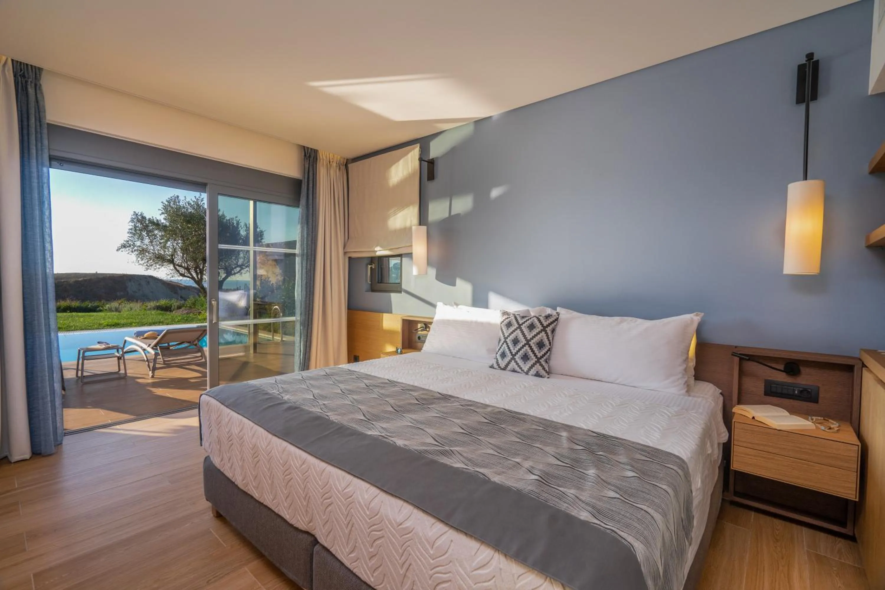 Bedroom, Bed in Apollonion Asterias Resort and Spa