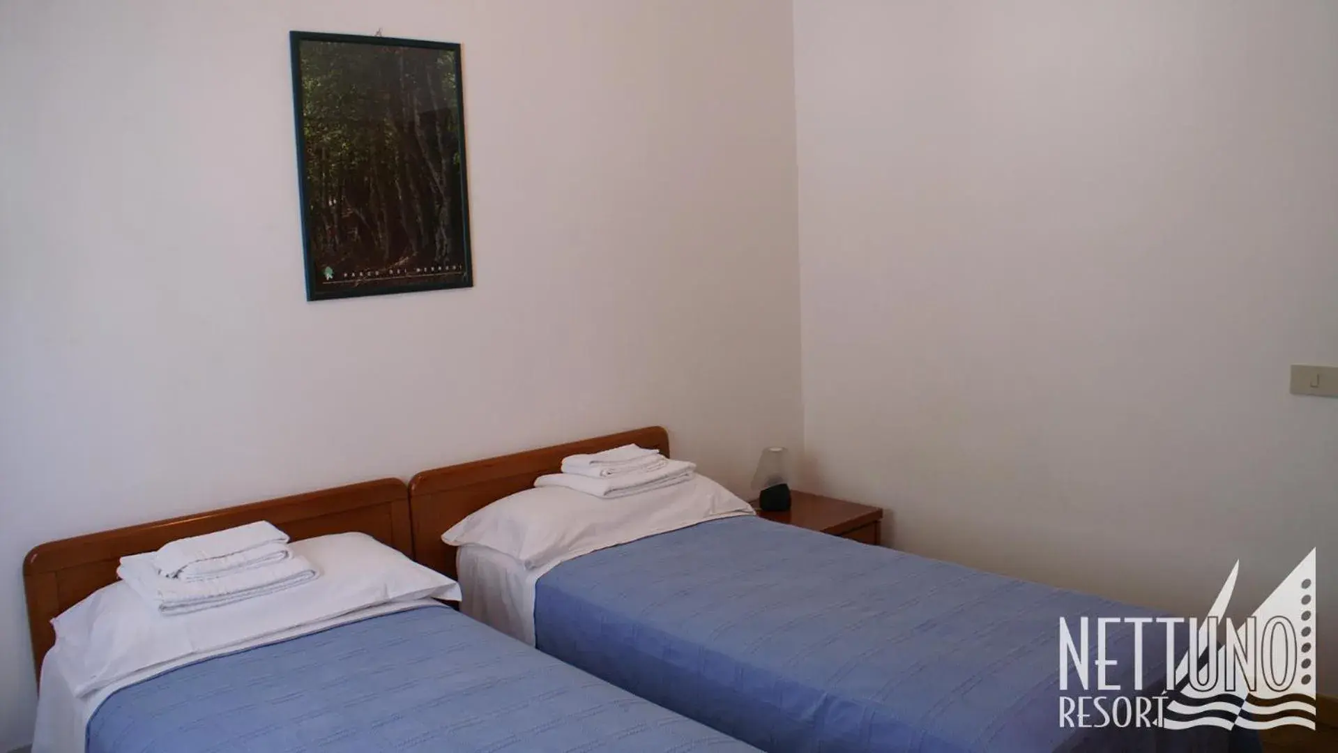 Bedroom, Bed in Nettuno Resort