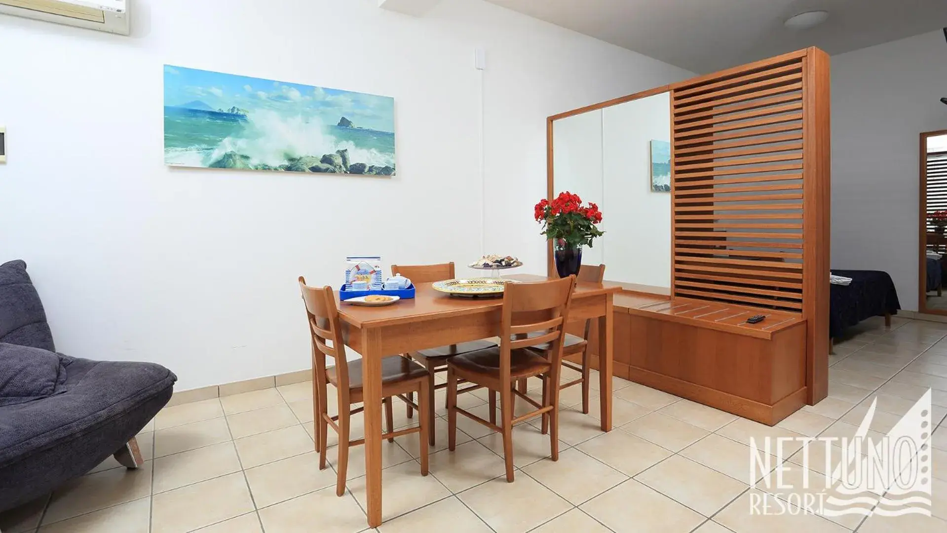 Kitchen or kitchenette, Dining Area in Nettuno Resort