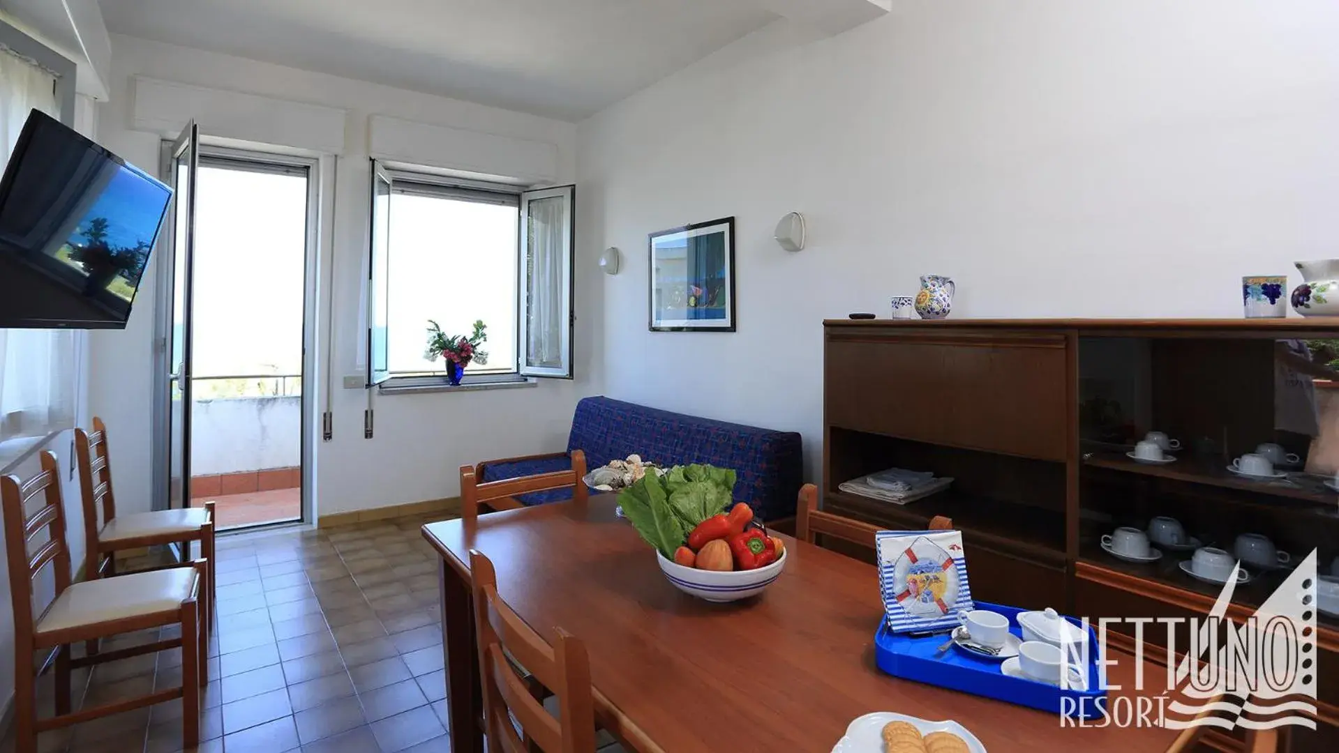 Living room, TV/Entertainment Center in Nettuno Resort