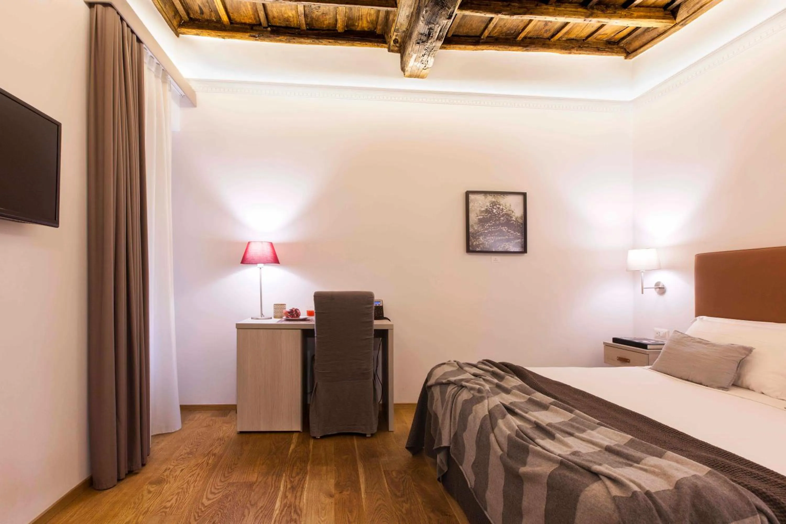 Bed in Giuturna Boutique Hotel